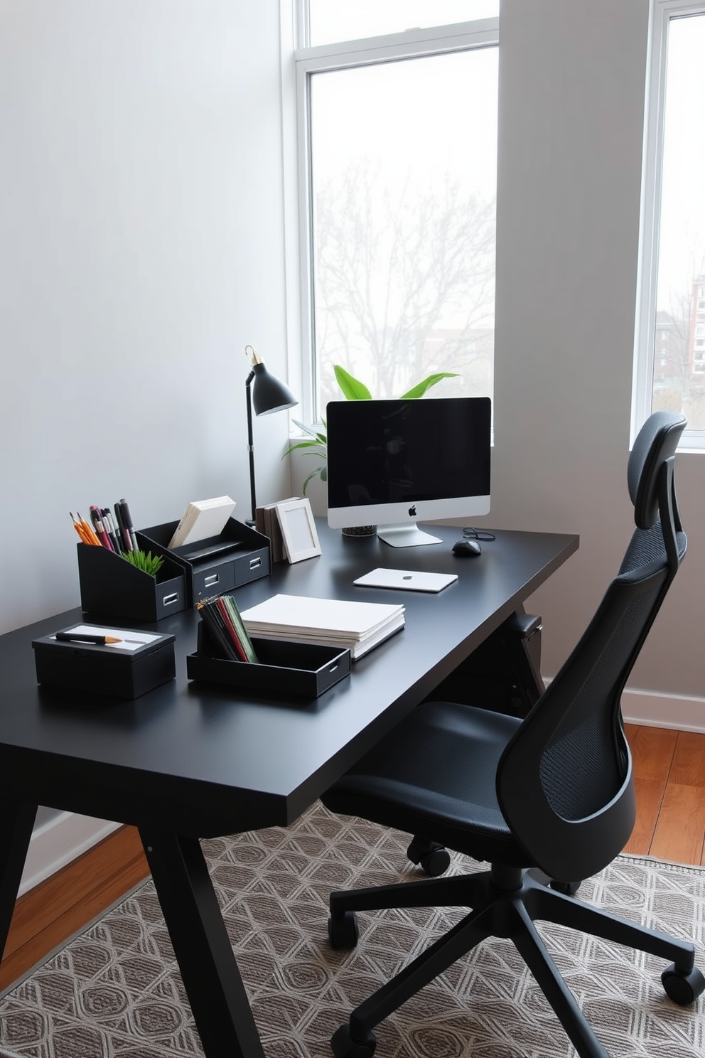 An elegant black desk organizer sits on a sleek black desk, designed to keep stationery and documents neatly arranged. The organizer features compartments of varying sizes, crafted from high-quality materials, enhancing the overall sophistication of the workspace. The home office showcases a modern black aesthetic, with a minimalist desk paired with a comfortable ergonomic chair. Large windows allow natural light to flood the space, highlighting the clean lines and stylish decor elements that promote productivity and focus.