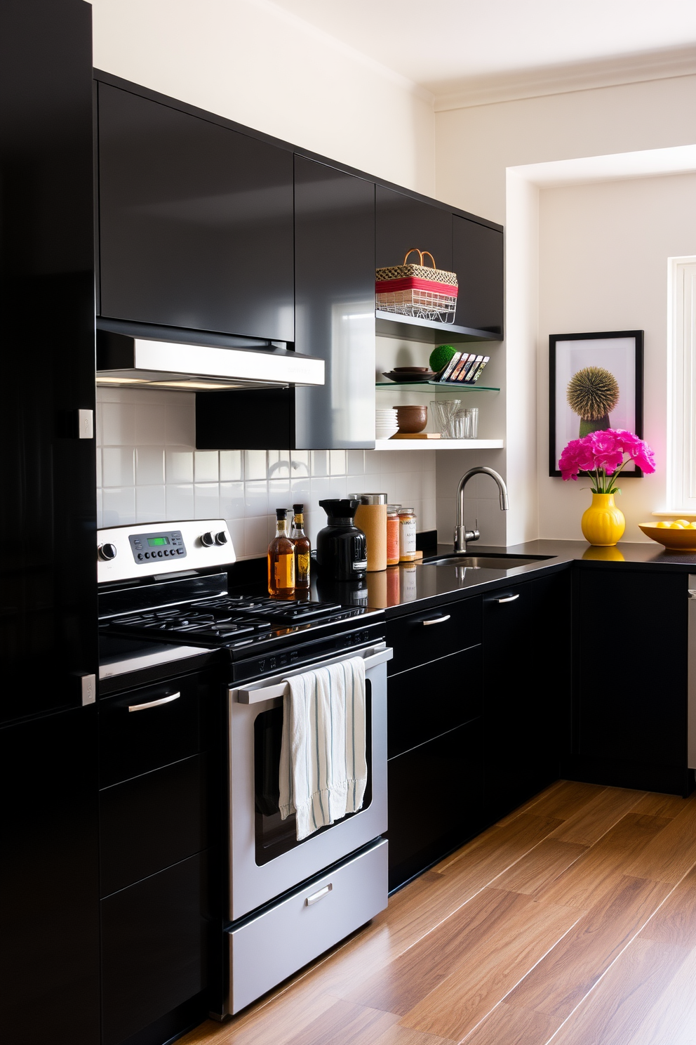 A sleek black kitchen with modern cabinetry and stainless steel appliances. Colorful kitchen accessories such as bright red pots and vibrant blue utensils are strategically placed on the countertops to add a playful contrast. The backsplash features white subway tiles that enhance the overall elegance of the space. A large island in the center provides ample workspace and is adorned with a bowl of fresh fruits in various colors for a lively touch.