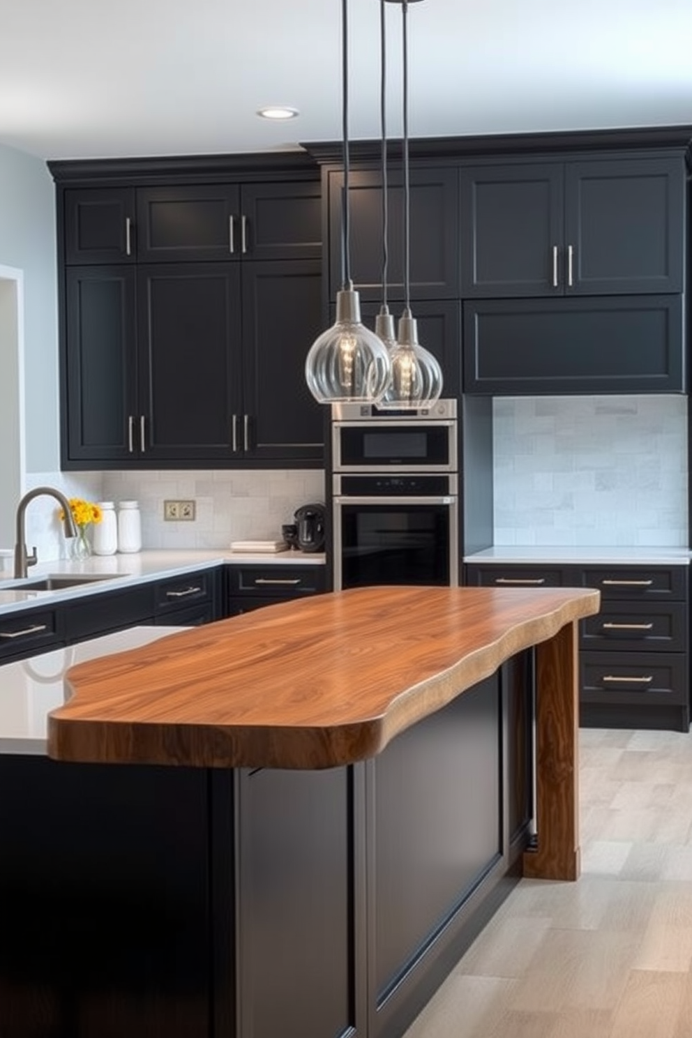 A sleek industrial kitchen design featuring black metal fixtures throughout the space. The cabinetry is matte black with minimalist hardware, complemented by an open shelving unit displaying rustic wooden accents. The countertop is a polished concrete with subtle texture and an integrated sink. Bold black pendant lights hang above a large island, creating a striking focal point in the room.