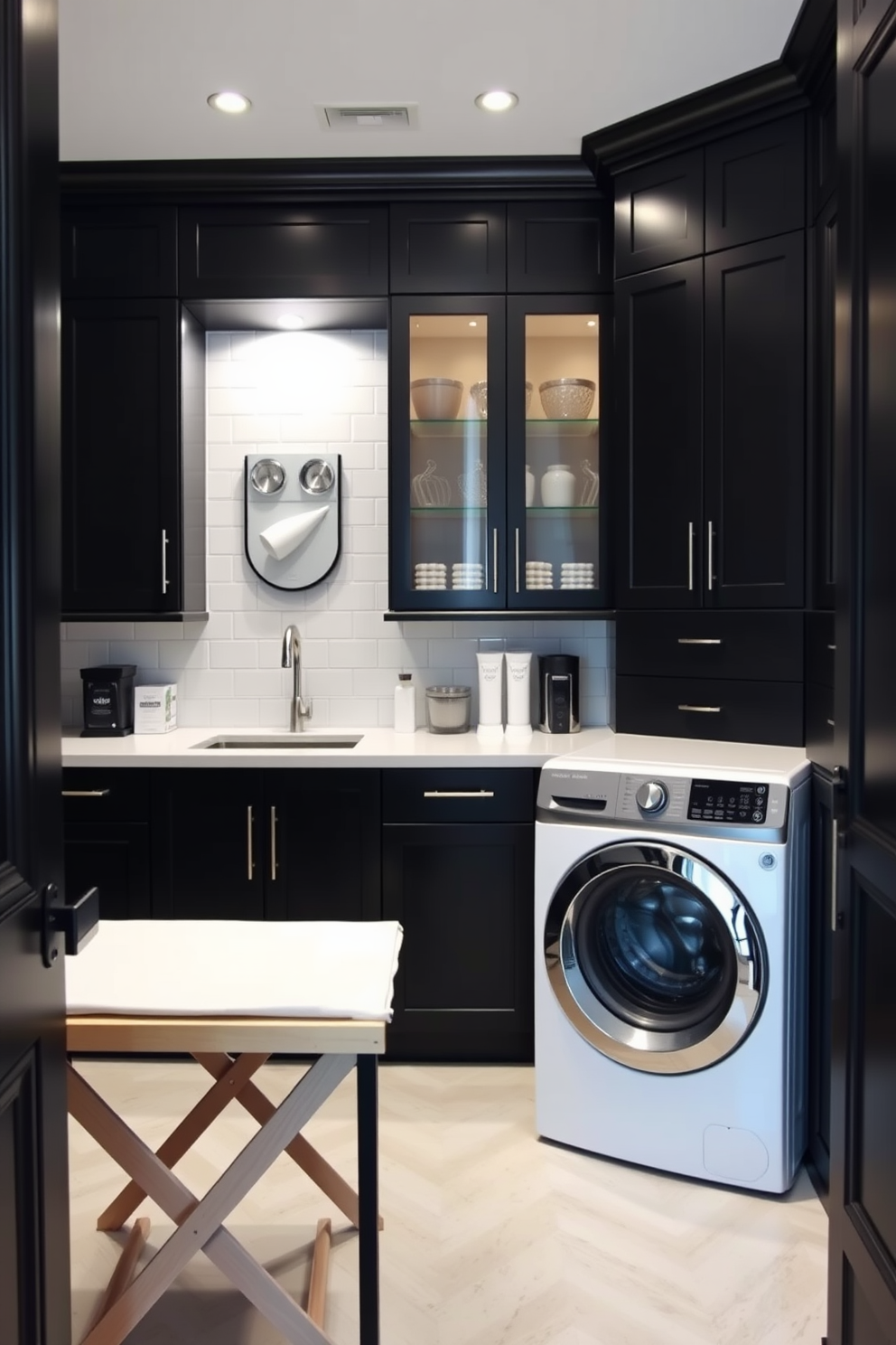 A stylish black laundry room featuring a creative use of space with a folding table. The room includes sleek black cabinets, a modern washing machine and dryer, and ample storage solutions to keep everything organized.