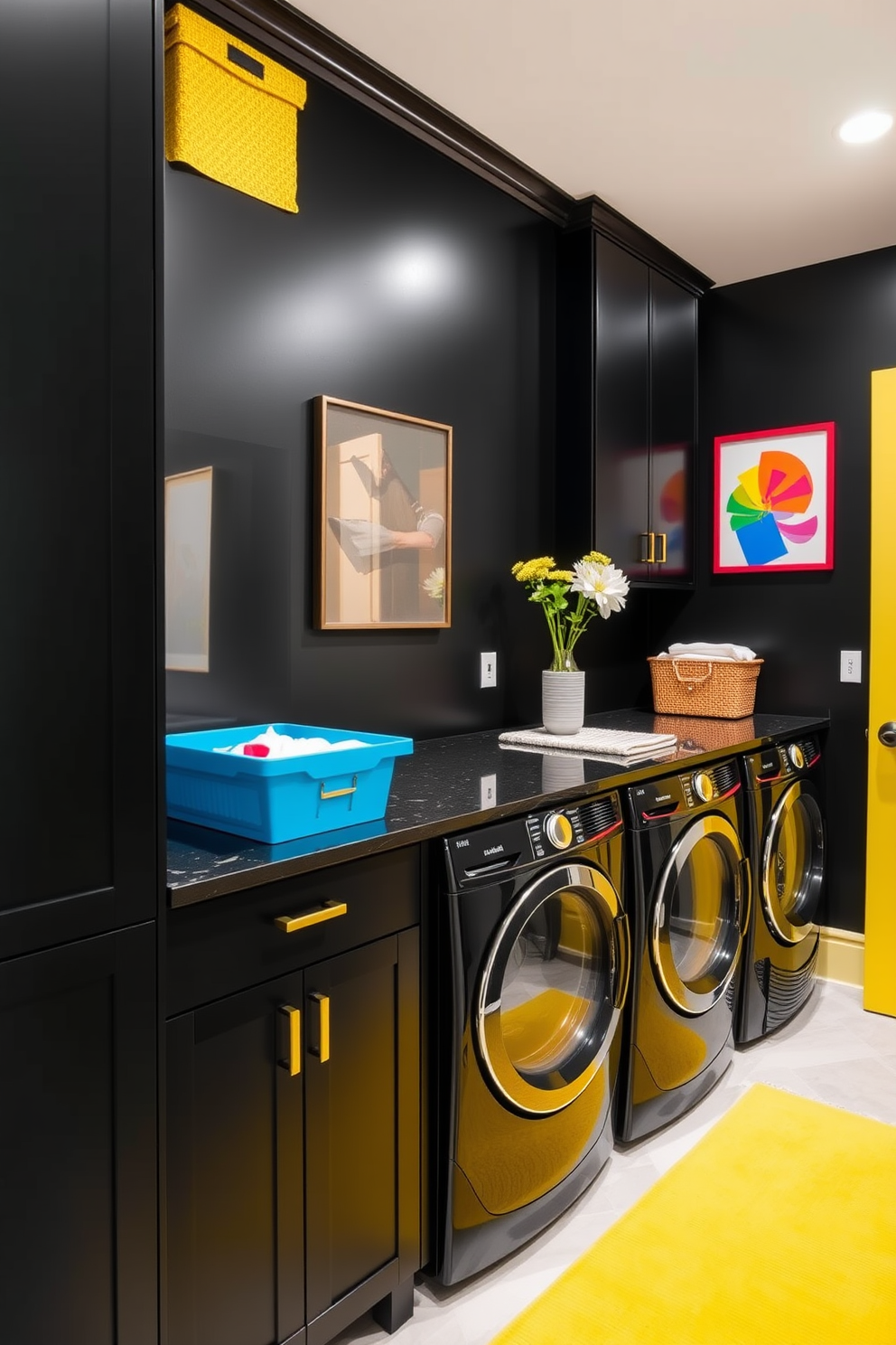 A modern laundry room featuring bold black walls that create a striking backdrop. Bright accents in the form of colorful storage bins and vibrant artwork add a playful touch. The space includes sleek black cabinetry with gold hardware for a touch of elegance. A stylish countertop provides ample space for folding laundry, complemented by a bright yellow rug for warmth.