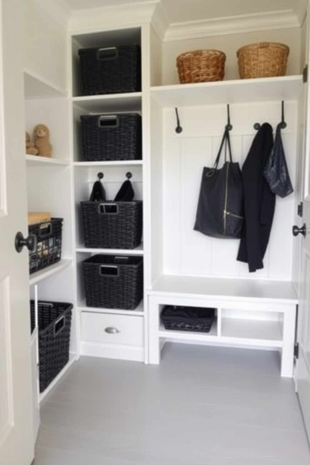 A stylish mudroom featuring black framed mirrors that enhance the sense of depth and space. The room includes built-in storage benches with hooks for coats, and a sleek tile floor for easy maintenance.