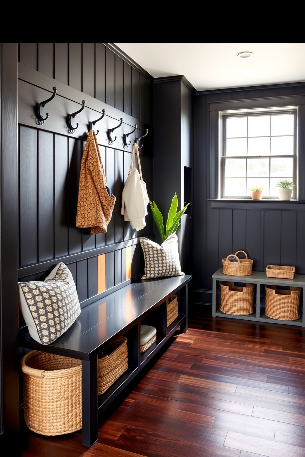 A cohesive black and wood color scheme creates a stylish and functional mudroom. The space features a sleek black bench with wooden accents, complemented by wall-mounted hooks for coats and bags. The flooring is a rich dark wood, while the walls are painted in a matte black finish. Natural light streams in through a large window, illuminating decorative elements like potted plants and woven baskets for storage.