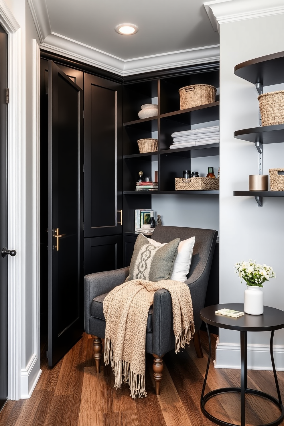 A stylish black pantry features sleek cabinetry with a matte finish that creates a modern aesthetic. The countertop workspace is made of polished quartz, offering ample space for meal prep and organization. The pantry is illuminated by warm under-cabinet lighting that highlights the black cabinetry and adds a cozy ambiance. Open shelving showcases decorative jars and cookbooks, blending functionality with chic design.