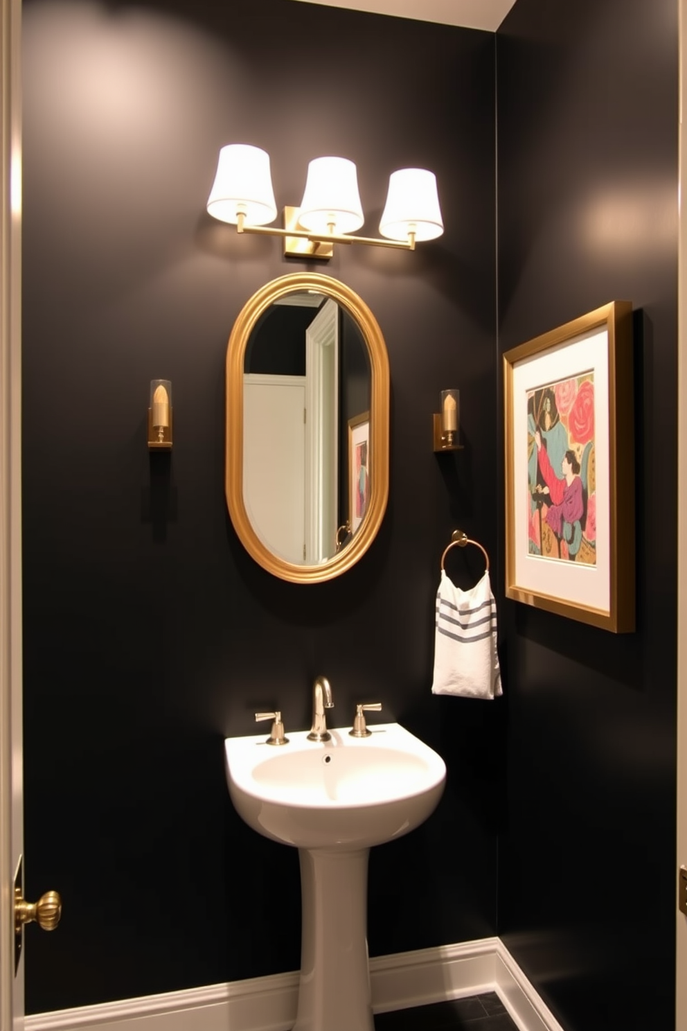 A striking black accent wall serves as the focal point of the powder room, creating a dramatic backdrop for the contrasting decor. The space features a sleek white pedestal sink and a gold-framed mirror that adds elegance and warmth. Stylish wall sconces provide soft lighting, enhancing the rich tones of the black wall. A vibrant piece of artwork hangs nearby, adding a pop of color and personality to the chic design.