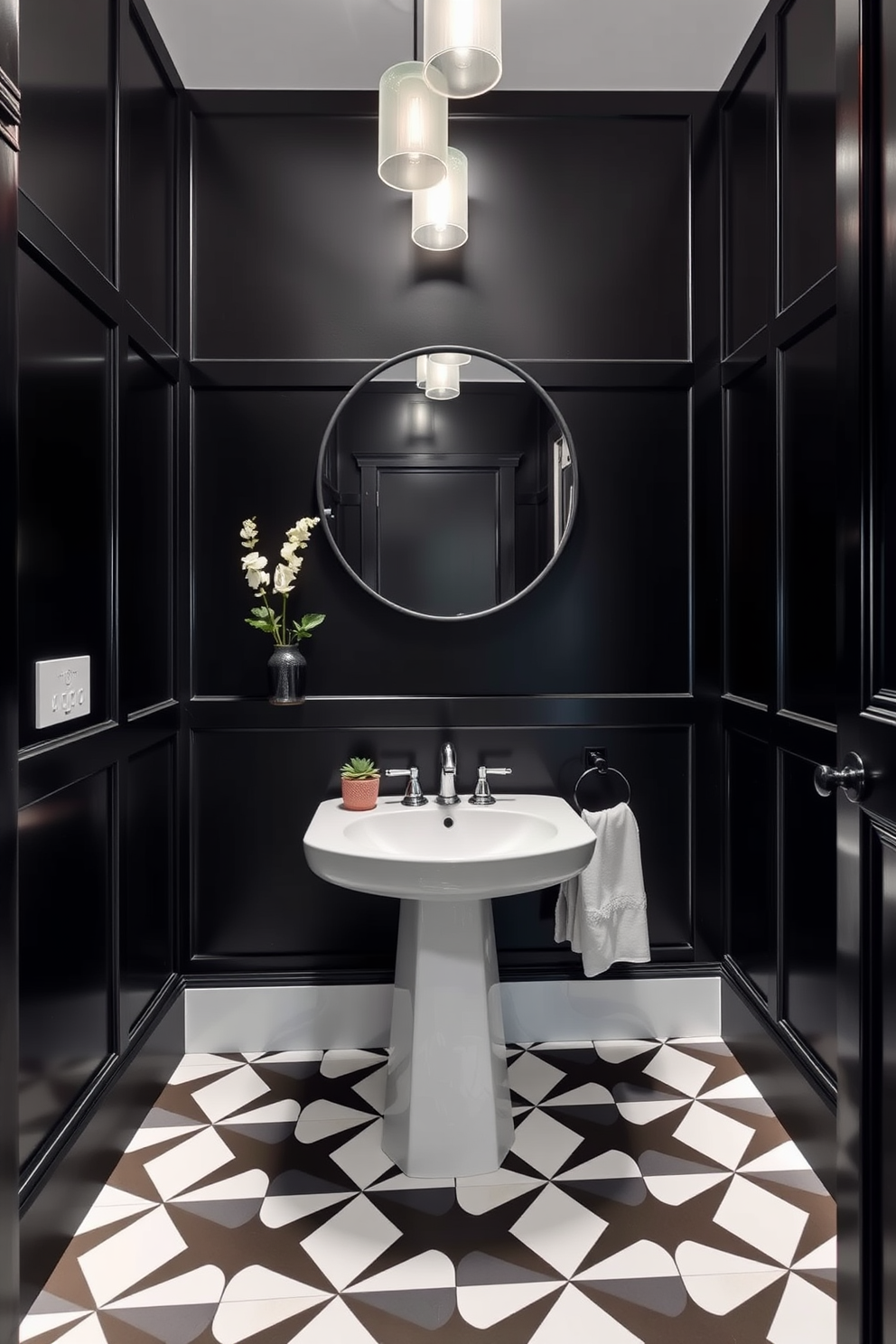 A striking black powder room features a black and white geometric patterned floor that creates a bold visual impact. The walls are adorned with sleek black paneling, and a modern pedestal sink with a chrome faucet stands out against the dark backdrop. A large round mirror with a thin black frame hangs above the sink, reflecting stylish lighting fixtures that add a touch of elegance. Decorative elements such as a small potted plant and luxurious hand towels in contrasting colors complete the sophisticated look of the space.