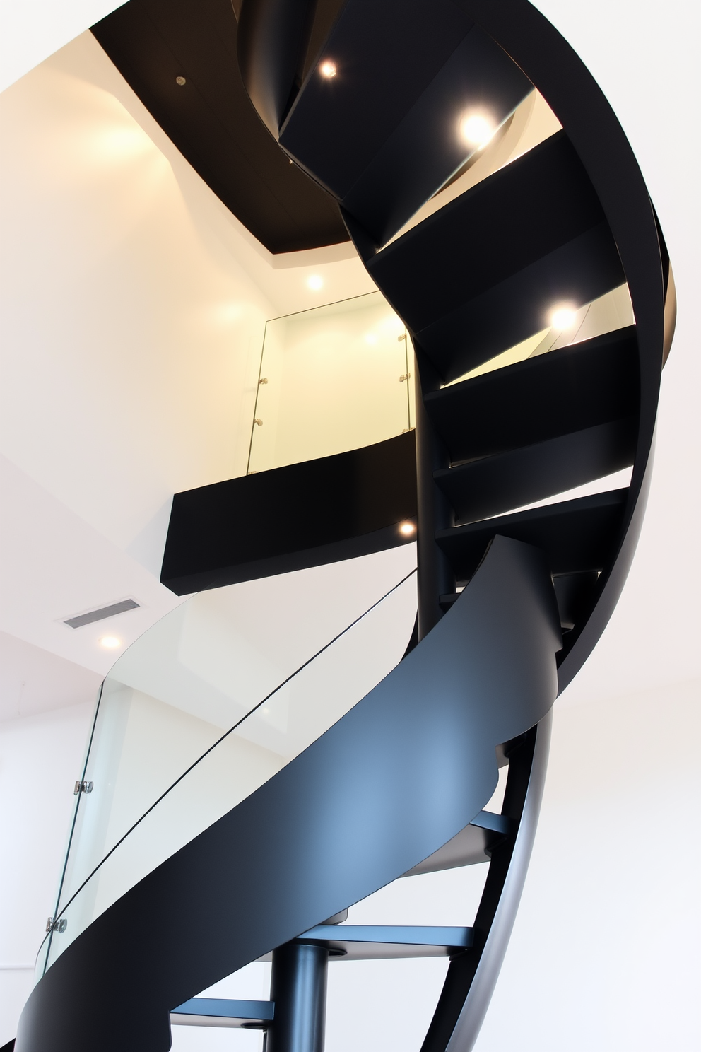 A modern black spiral staircase elegantly winds upwards, featuring a sleek glass railing that enhances its contemporary aesthetic. The staircase is illuminated by soft recessed lighting, creating a striking focal point in the open-concept space.