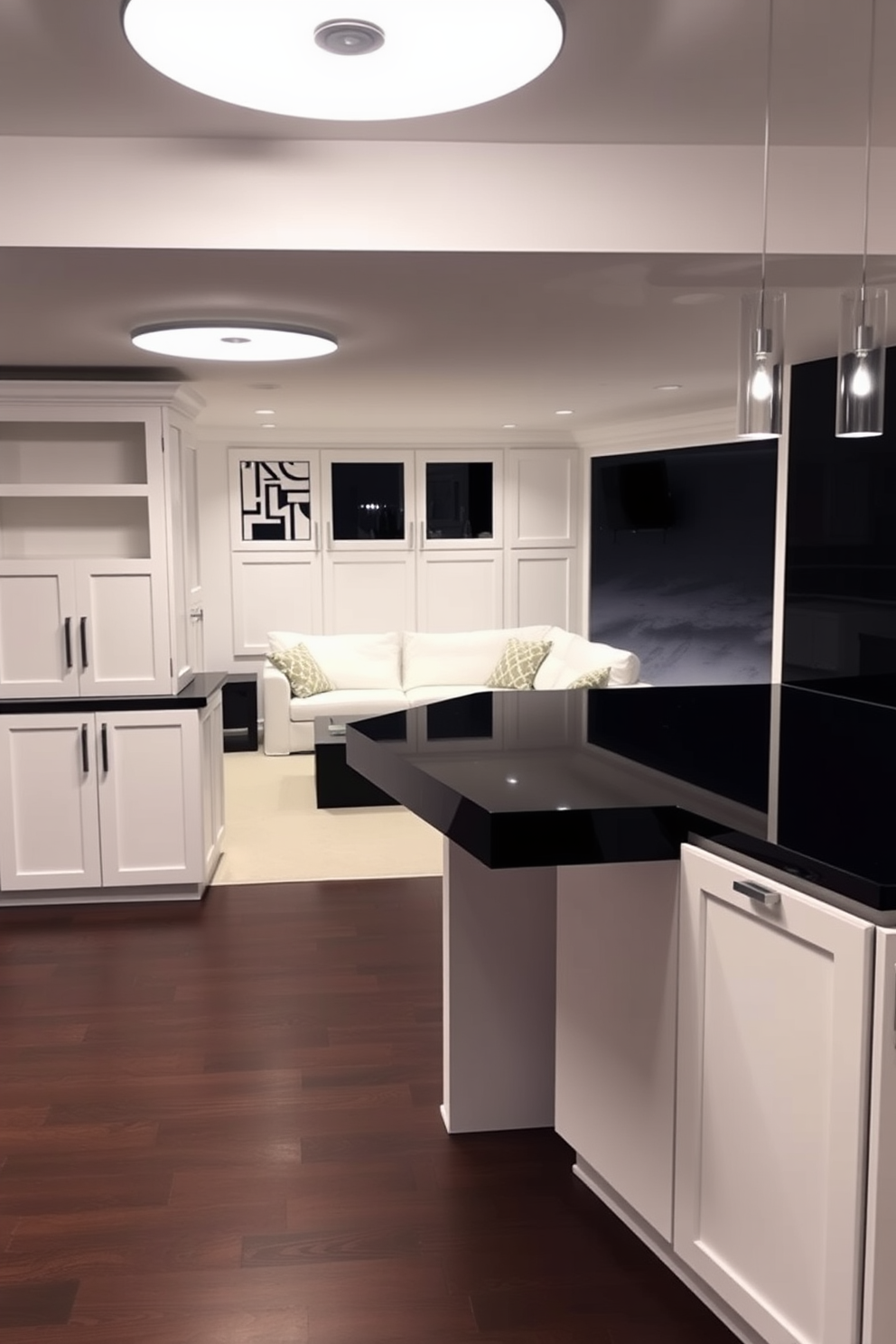 A sleek minimalist bar area features a black countertop with a glossy finish and white cabinetry that provides ample storage. Above the counter, pendant lights with a modern design illuminate the space, creating an inviting atmosphere for social gatherings. The black and white basement design incorporates an open layout with a plush white sectional sofa and a large black coffee table at the center. The walls are painted in a crisp white, while the flooring is a dark hardwood, adding contrast and warmth to the overall aesthetic.