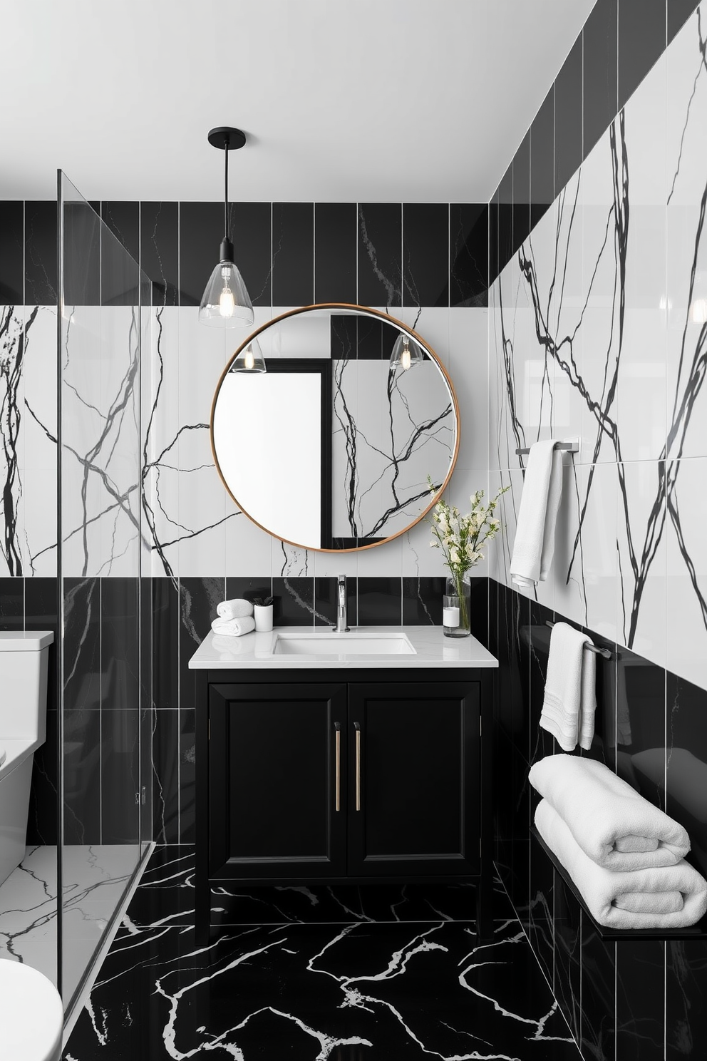 A stylish black vanity with a white countertop serves as the centerpiece of the bathroom. The walls are adorned with elegant black and white tiles, creating a striking contrast that enhances the overall aesthetic. The space is illuminated by modern pendant lights hanging above the vanity. A large round mirror with a sleek frame reflects the sophisticated design, while plush white towels are neatly arranged nearby.