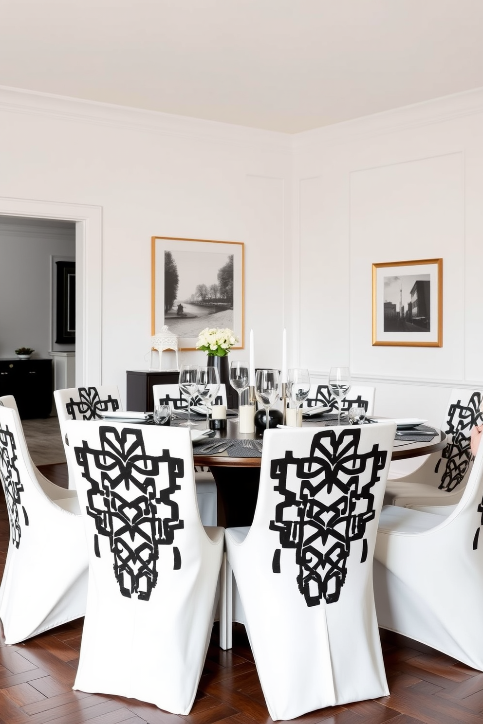 A stylish dining room featuring white chairs adorned with bold black geometric patterns. The table is set with elegant dinnerware, and the walls are painted in a crisp white to enhance the modern aesthetic.