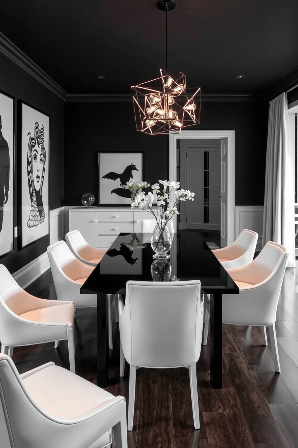 A sophisticated black and white dining room features a sleek rectangular table with a glossy black finish surrounded by elegant white upholstered chairs. The walls are adorned with black and white artwork, and a striking chandelier with geometric shapes hangs above the table, casting a warm glow over the space.