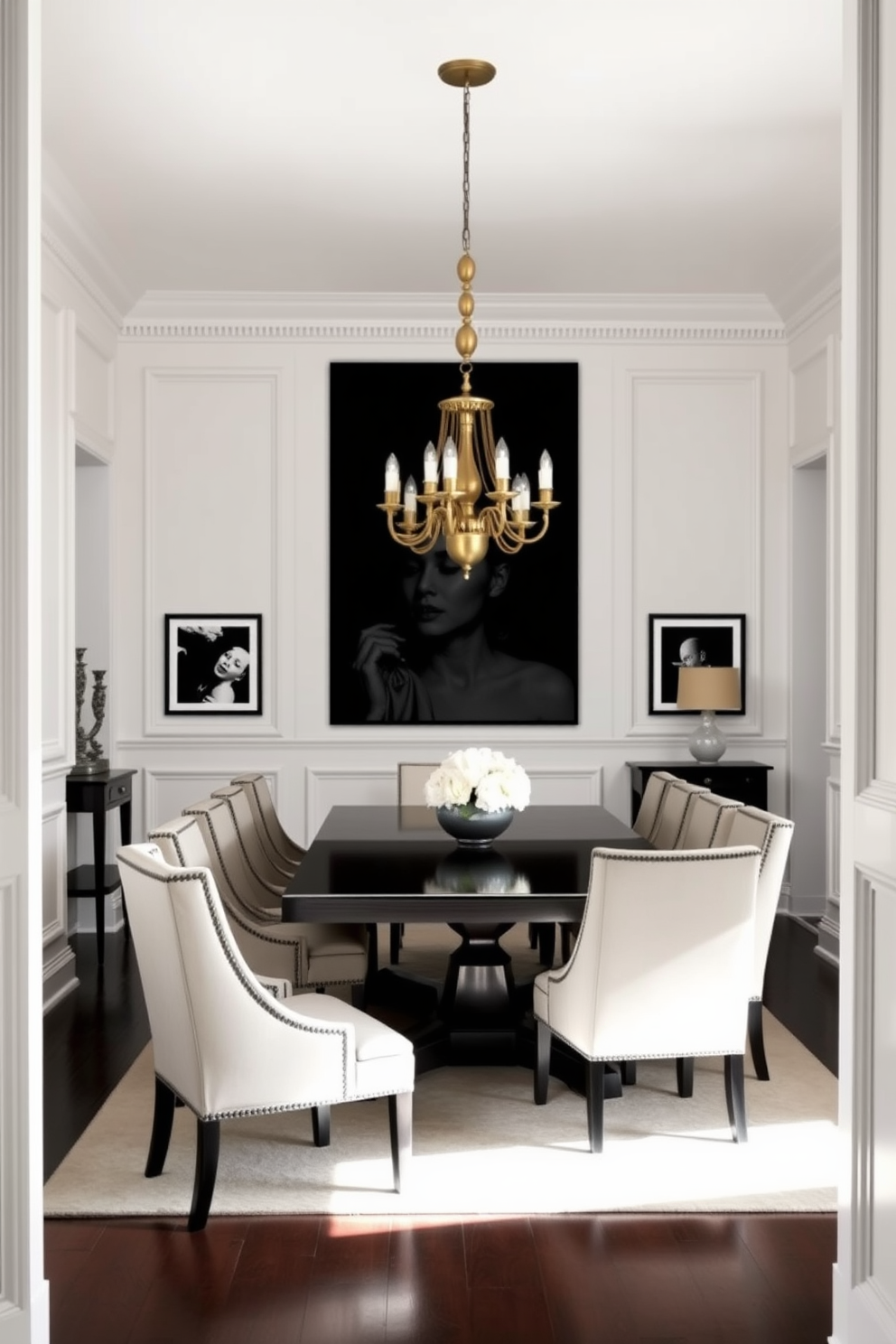 A classic dining room featuring white wainscoting with elegant black trim. The room is adorned with a large rectangular dining table surrounded by upholstered chairs in a monochrome palette. A striking chandelier hangs above the table, casting a warm glow over the space. On the walls, black and white artwork complements the sophisticated color scheme, enhancing the overall aesthetic.