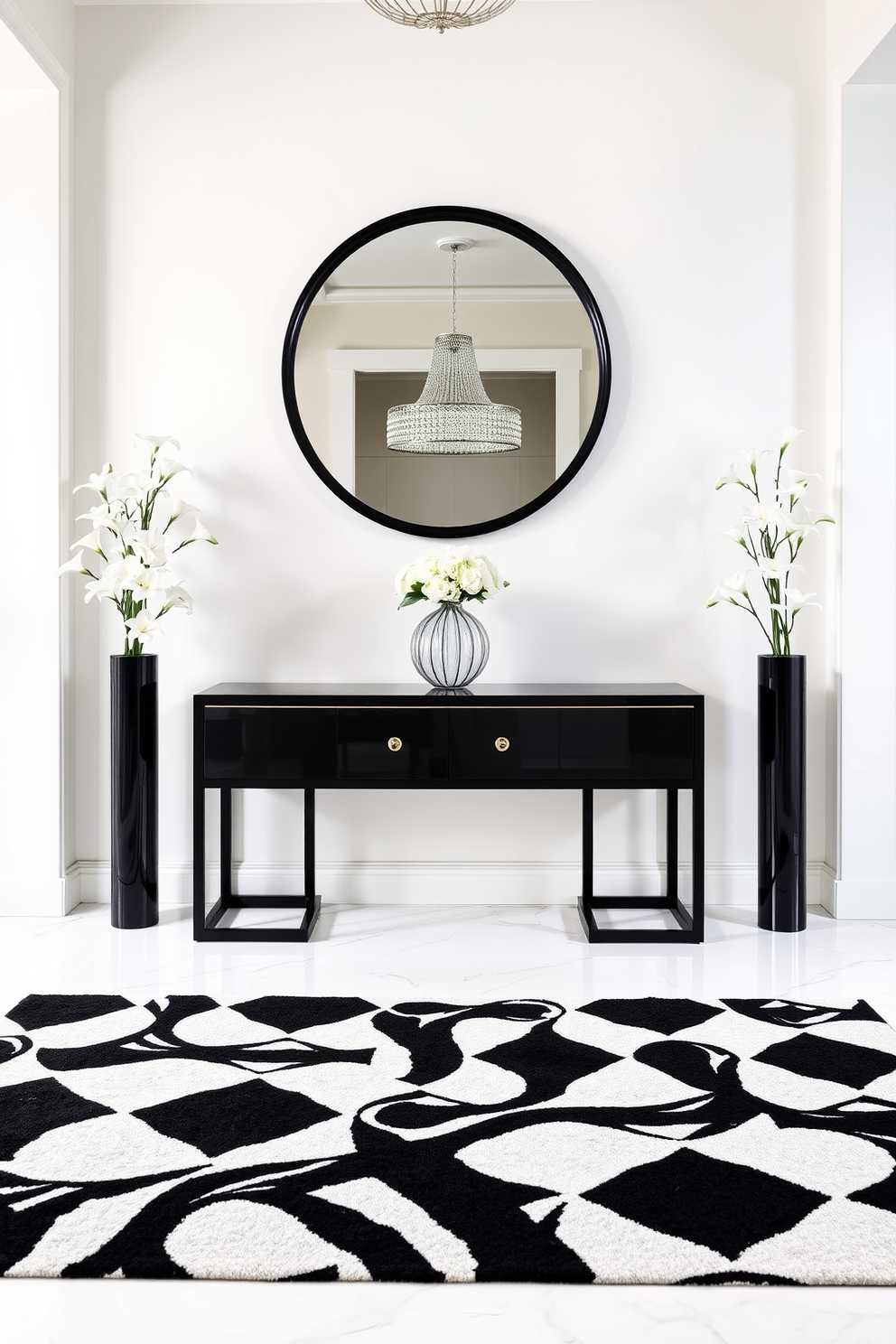 Refined black and white console with mirror. The console features a sleek black finish with elegant gold accents and is topped with a large round mirror framed in black. The foyer is adorned with a striking black and white geometric rug that contrasts beautifully with the polished white marble flooring. Flanking the console are two tall black vases filled with white lilies, adding a touch of sophistication to the space.