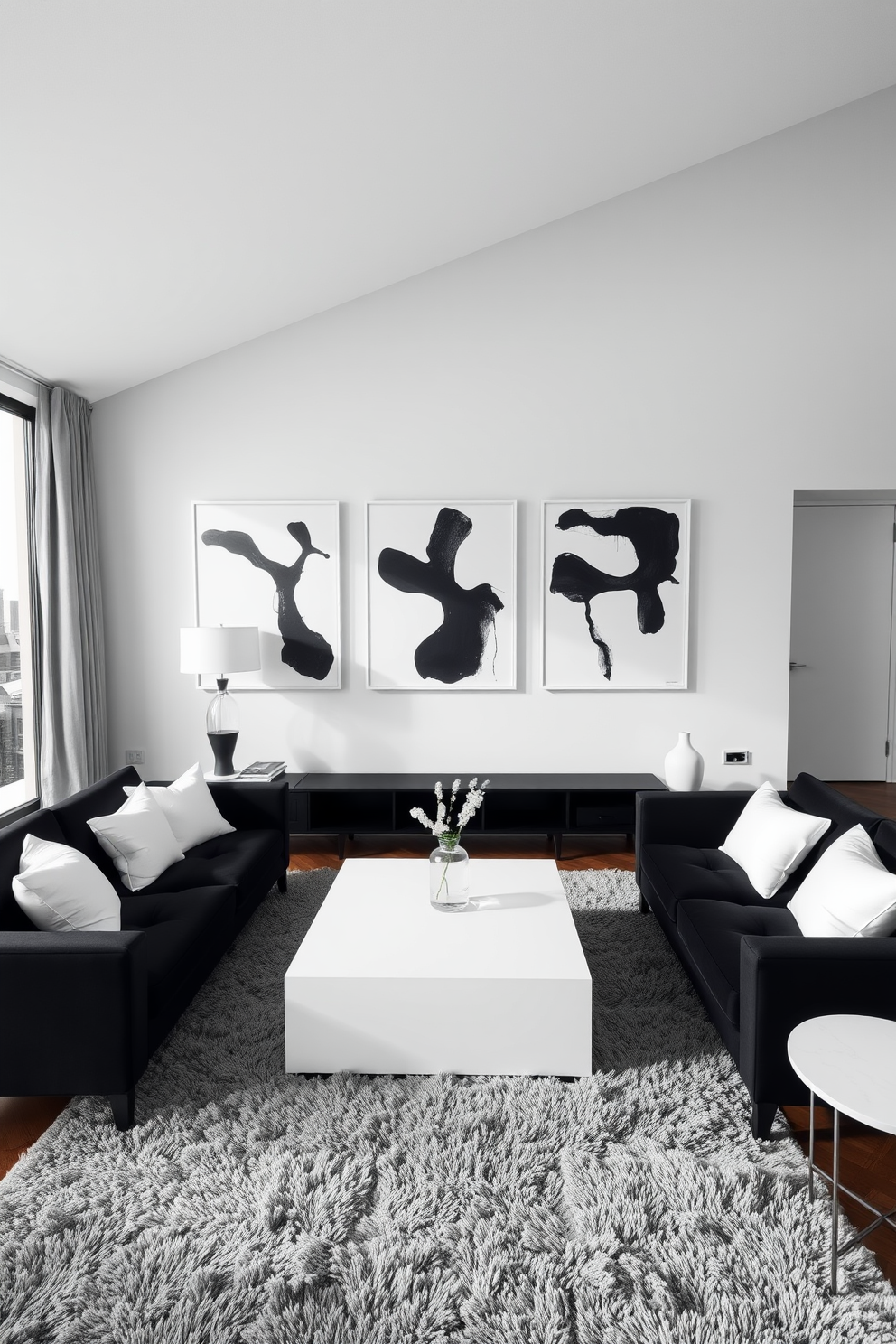 A chic living room featuring monochrome abstract art adorning the walls. The space is designed with a sleek black sofa, accented by white cushions and a minimalist coffee table at the center. Floor-to-ceiling windows allow natural light to flood the room, highlighting the contrast between the dark furniture and light decor. A plush area rug in shades of gray adds warmth and texture to the overall aesthetic.