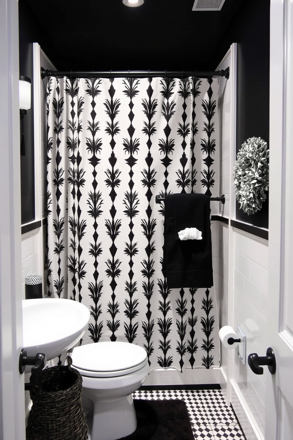 A chic powder room adorned with black and white floral wallpaper that exudes elegance. The space features a sleek black vanity with a white marble sink and a large round mirror framed in black. To the left, a stylish wall-mounted shelf displays decorative items in monochrome tones. The floor is covered with black and white geometric tiles, adding a modern touch to the classic design.