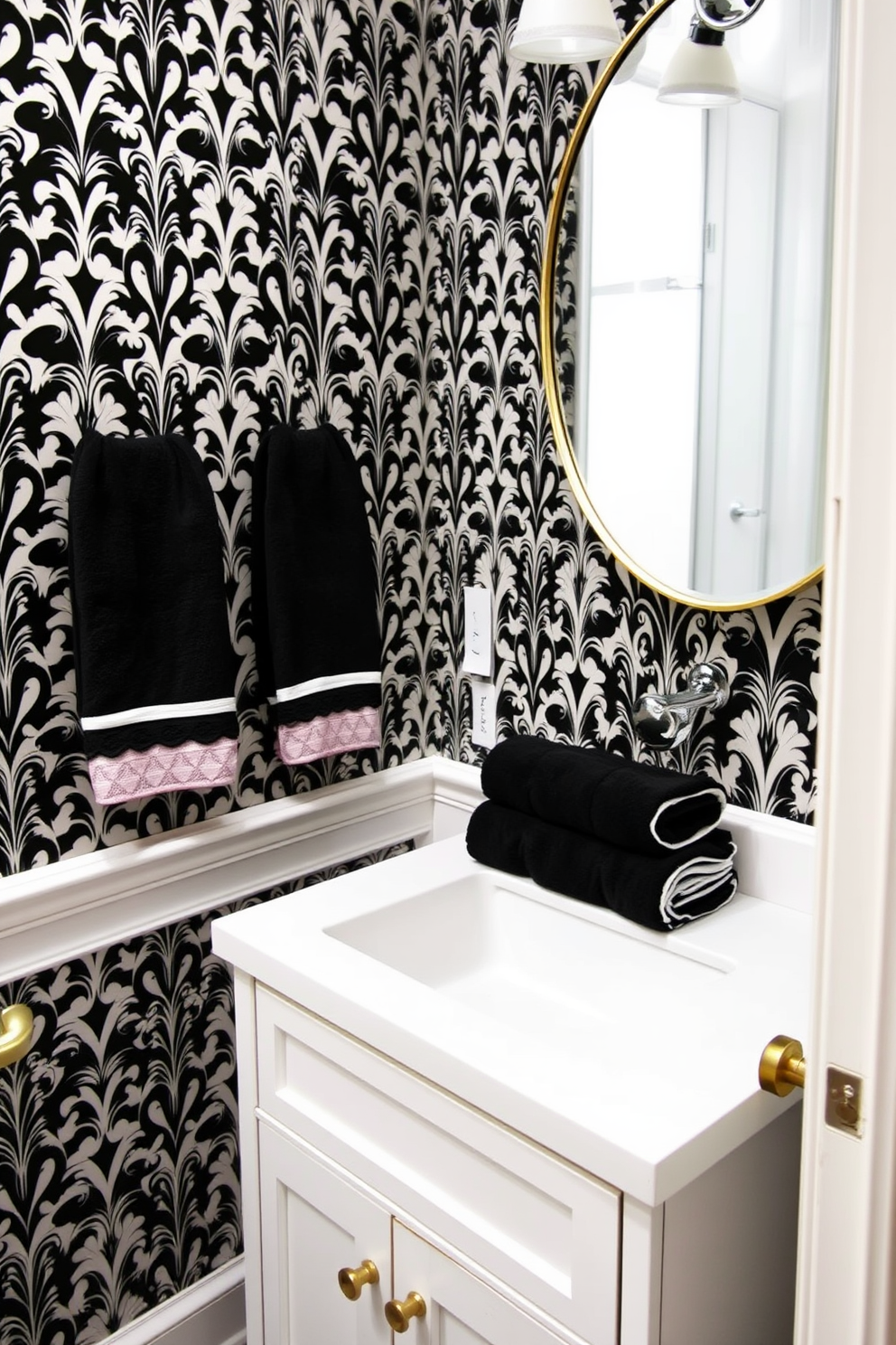 Crown molding in black adds a touch of sophistication to the space. The walls are painted in a crisp white, creating a striking contrast with the dark moldings. A sleek black vanity with a marble top serves as the focal point of the room. Elegant black and white patterned wallpaper lines the walls, enhancing the overall aesthetic.