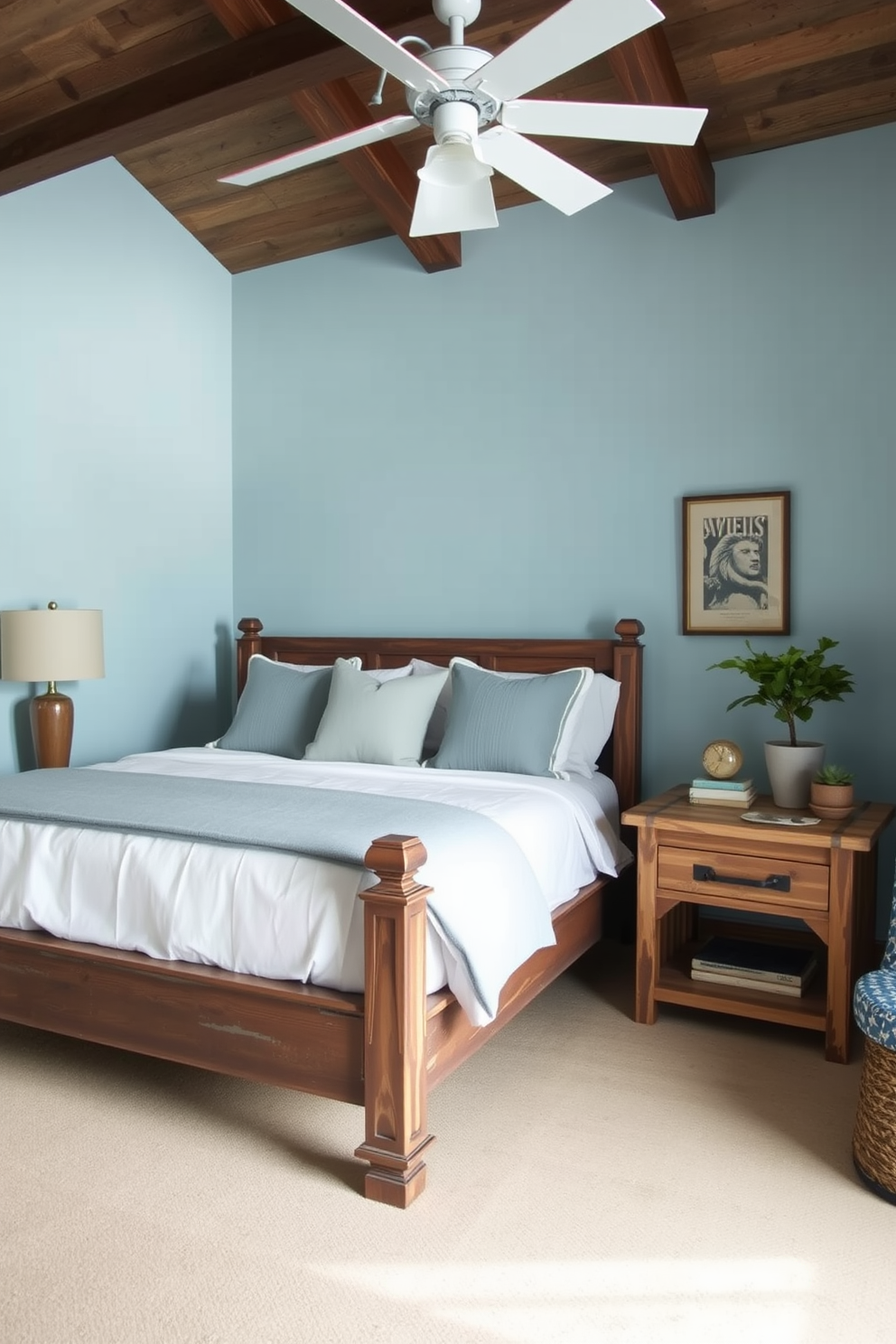 A serene bedroom featuring dusty blue accents throughout the decor. The walls are painted in a soft dusty blue hue, complemented by rustic wooden beams on the ceiling. A cozy king-sized bed is dressed in white linens with dusty blue throw pillows. To one side, a reclaimed wood nightstand holds a vintage lamp and a small potted plant.