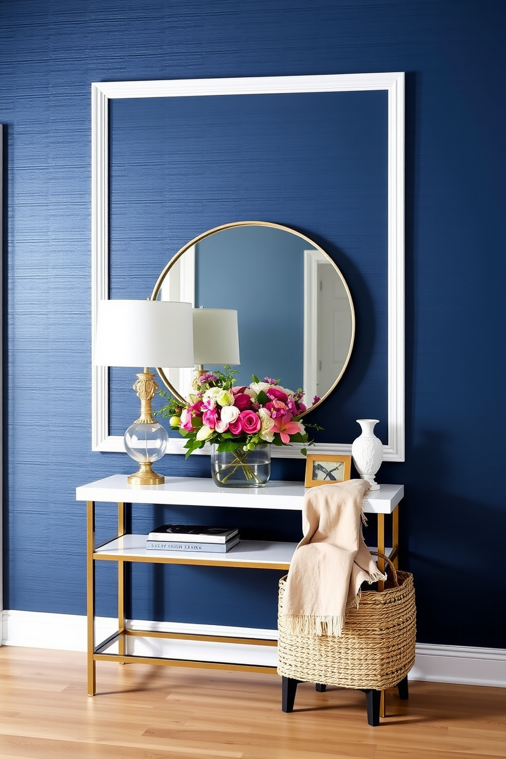 Elegant navy blue accent wall design. The wall features a textured wallpaper that adds depth, complemented by sleek white trim. Blue foyer design ideas. A stylish console table sits against the navy wall, adorned with a large round mirror and a vibrant floral arrangement.