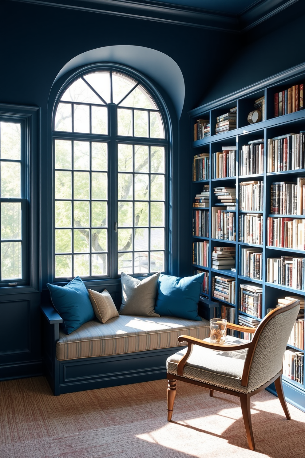 A chic blue ottoman sits elegantly in the room providing additional seating. Its plush fabric complements the surrounding decor while adding a pop of color. The blue home library features floor-to-ceiling bookshelves filled with an array of books. A cozy reading nook with a comfortable armchair and soft lighting creates an inviting atmosphere for relaxation.