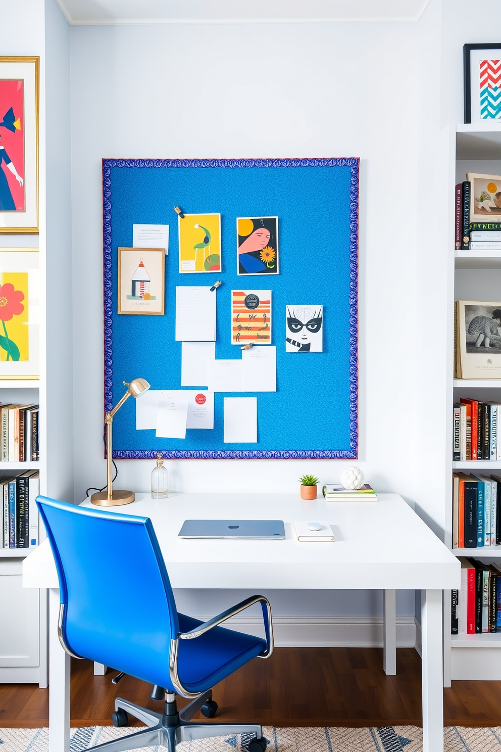 Bright blue bulletin board for organization. The board is mounted on a white wall and surrounded by framed artwork in vibrant colors. Blue home office design ideas. The office features a sleek white desk with a blue chair, complemented by shelves filled with books and decorative items.