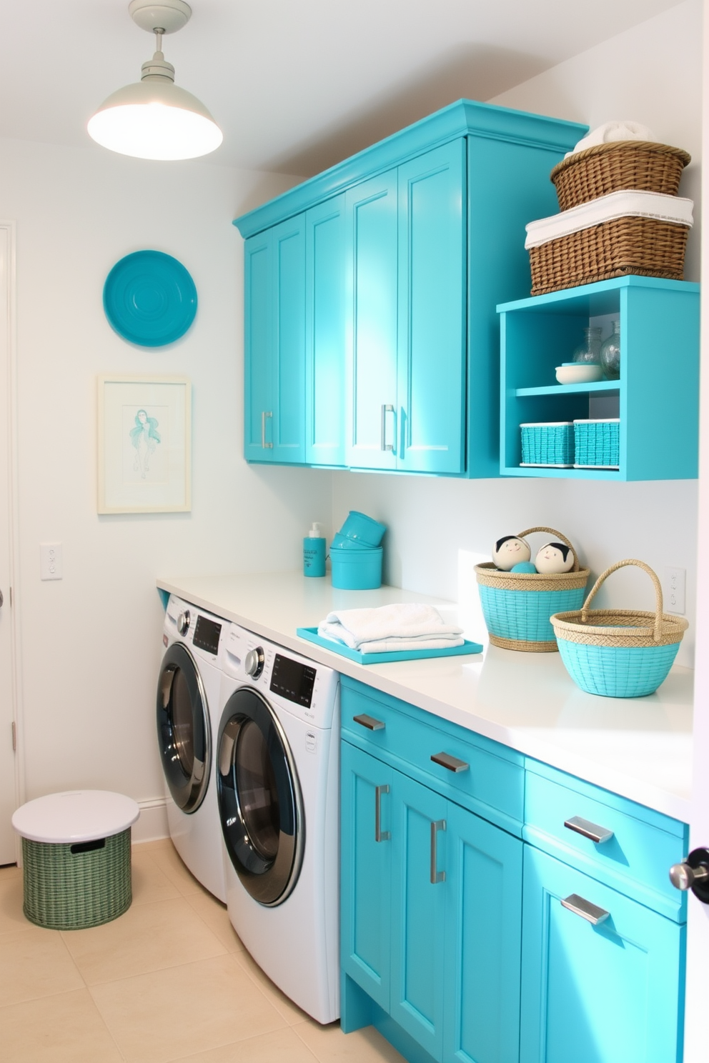 A bright and cheerful laundry room featuring vibrant turquoise accessories and decor. The walls are painted in a soft white, creating a fresh and airy atmosphere. Turquoise cabinets provide ample storage space while adding a pop of color. A stylish countertop in a complementary shade offers a functional area for folding clothes, and decorative baskets in various shades of blue enhance the overall design.