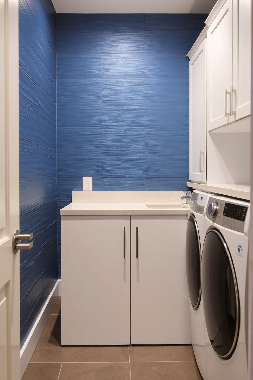 Textured blue wall panels create a sense of depth and sophistication in the laundry room. The space is enhanced with sleek white cabinetry and modern appliances, providing both functionality and style.