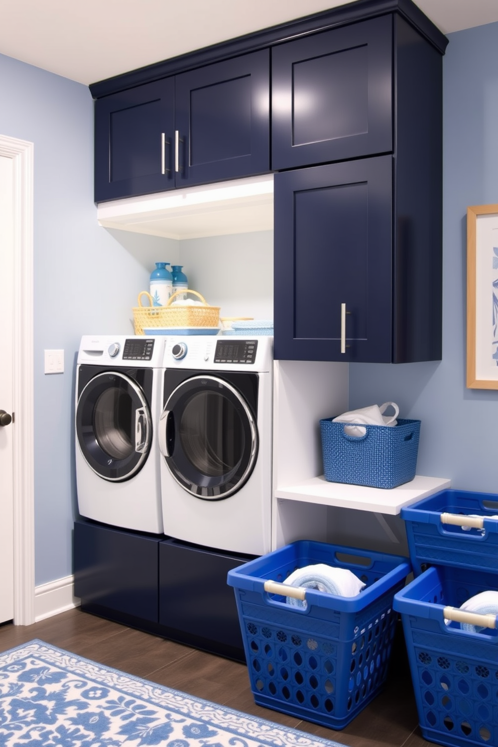 A serene laundry room featuring a monochromatic blue color scheme. The walls are painted in a soft powder blue, complemented by dark navy cabinetry and vibrant cobalt blue accessories. A stylish washer and dryer are seamlessly integrated into the cabinetry, with matching blue laundry baskets neatly arranged nearby. Decorative elements, such as a blue patterned rug and wall art, enhance the cohesive look while adding a touch of personality.