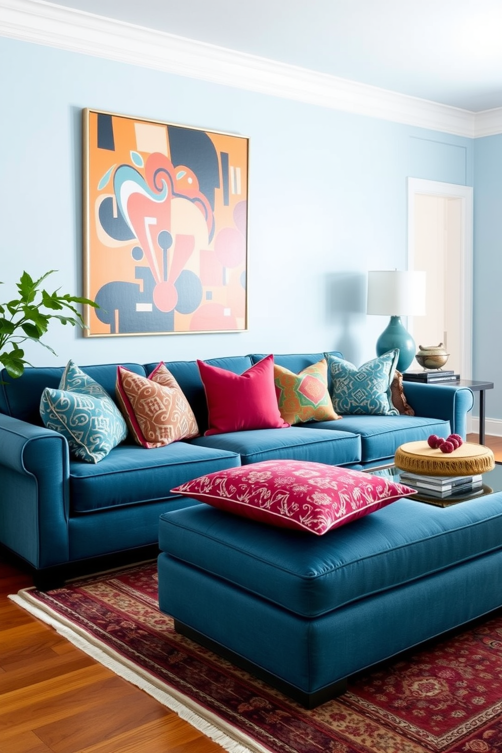 A stylish blue living room featuring a teal sofa adorned with an array of colorful throw pillows. The walls are painted in a soft light blue, and a large area rug with intricate patterns covers the hardwood floor.