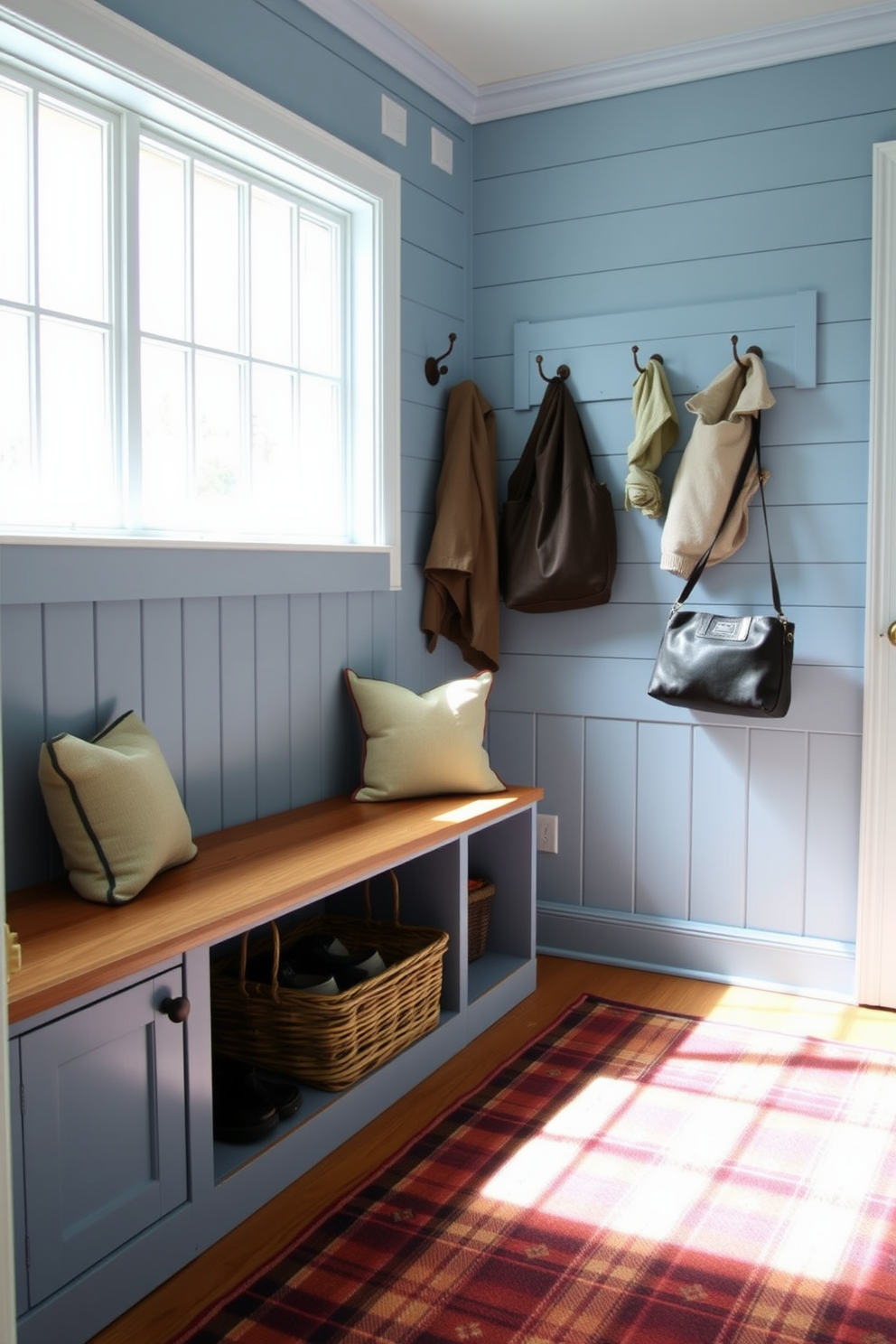 A vibrant mudroom featuring a turquoise tile backsplash that adds a striking pop of color. The space includes built-in storage benches with plush cushions and hooks for hanging coats and bags. Natural light floods the room through a large window, illuminating the light wood flooring. Decorative elements like potted plants and a colorful rug enhance the inviting atmosphere.