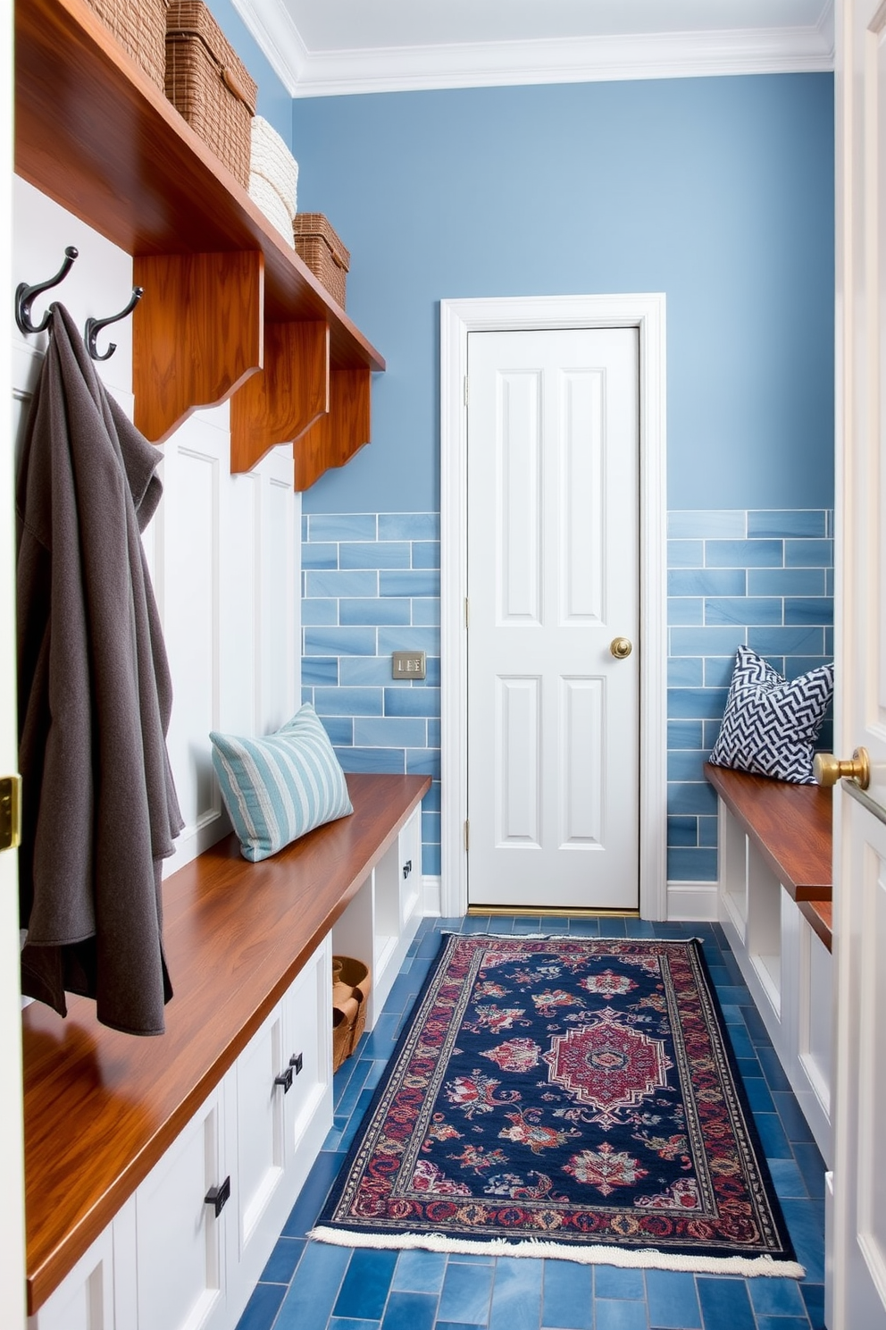 A pastel blue sliding barn door opens into a bright and airy mudroom featuring shiplap walls and a cozy bench with soft cushions. The space is adorned with hooks for coats and a stylish rug that adds warmth, creating an inviting atmosphere for guests.