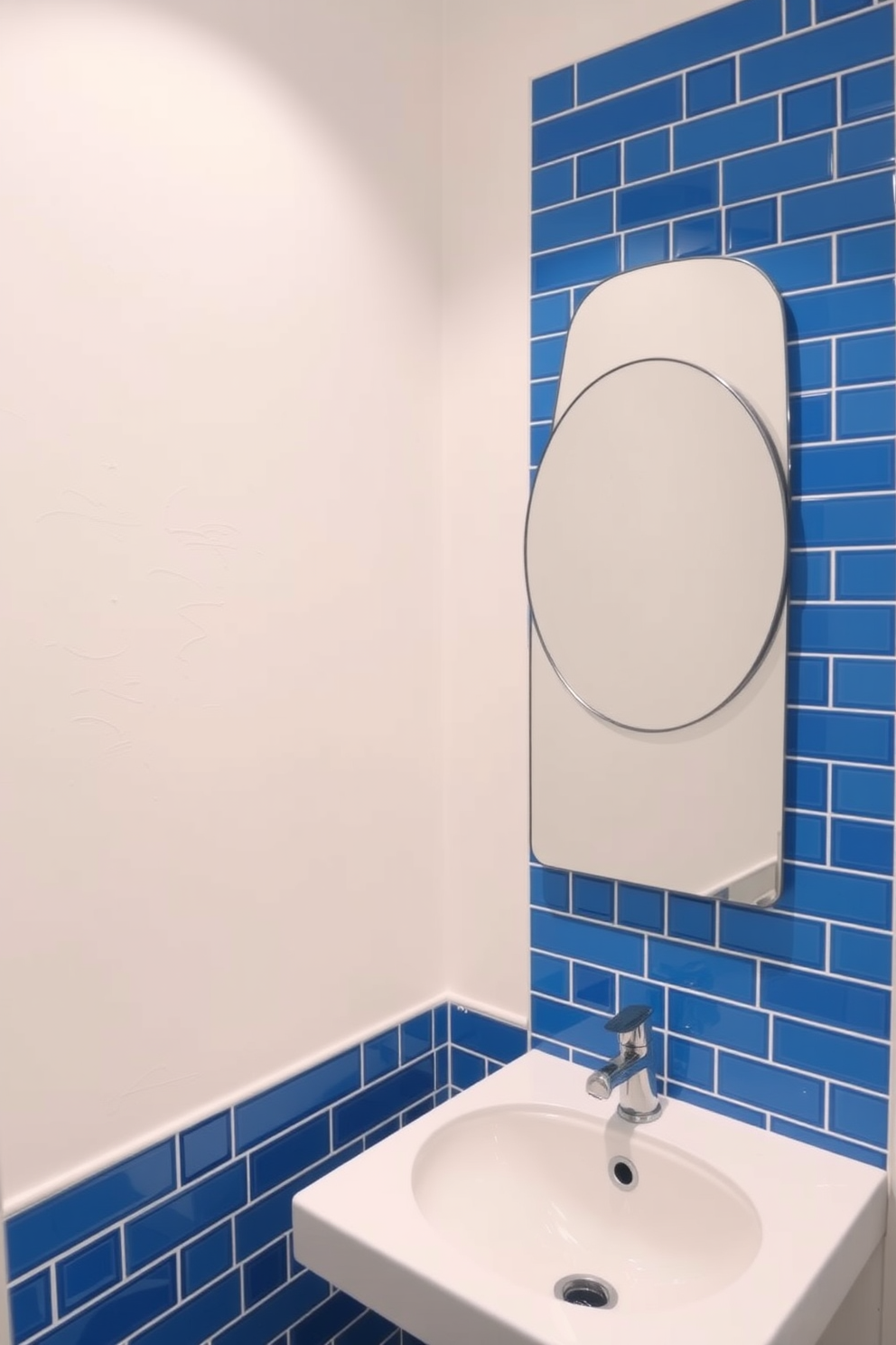 A bright powder room features vibrant blue tiles that surround a sleek, modern mirror. The walls are painted in a soft white, creating a fresh and airy atmosphere.