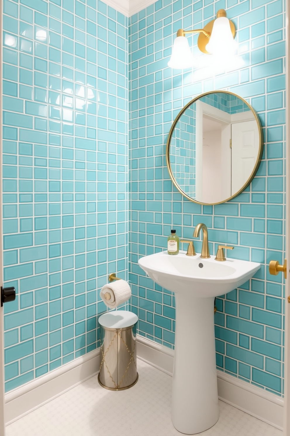 A chic powder room featuring vibrant turquoise tiles that create an eye-catching accent wall. The space is complemented by a sleek white pedestal sink and a stylish round mirror with a brushed gold frame.