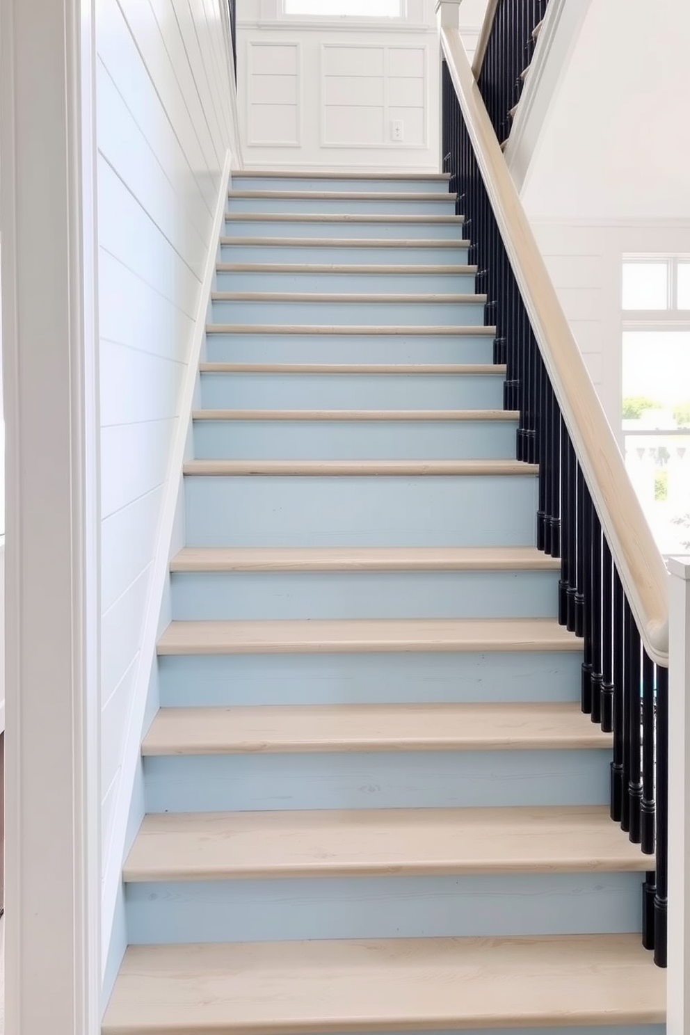 A pastel blue staircase winds gracefully upwards, adorned with vintage decor that includes ornate picture frames and a charming wooden railing. The walls are lined with soft white wainscoting, and a plush runner in a complementary shade of blue adds warmth to the steps.