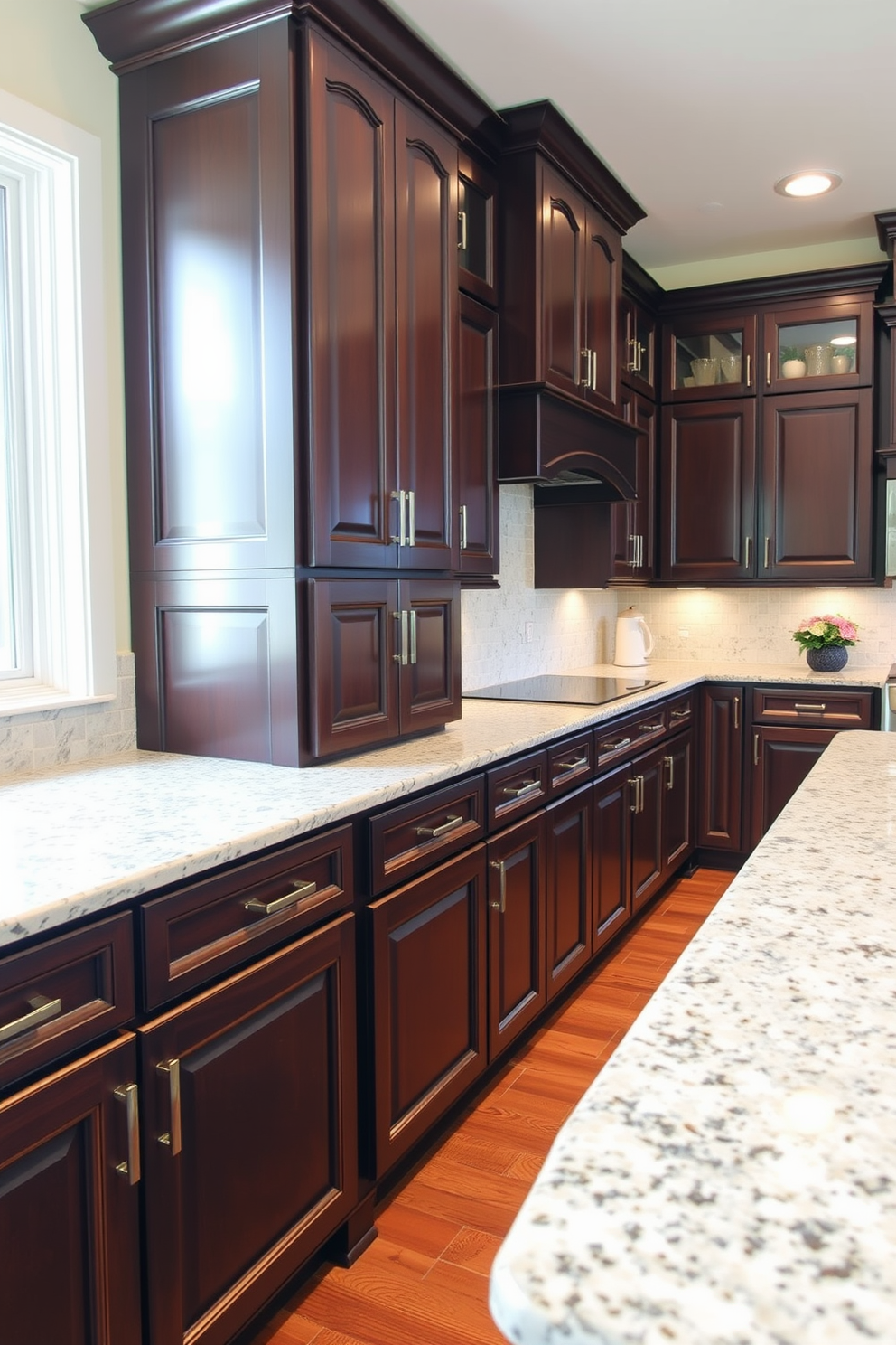 A warm and inviting kitchen featuring dark wood cabinets adorned with brushed nickel handles. The countertops are a light granite that contrasts beautifully with the rich tones of the cabinetry, creating a harmonious balance in the space.