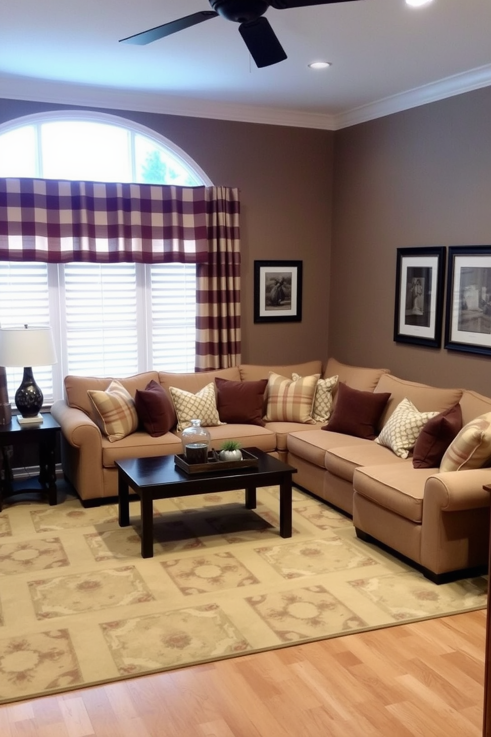 A cozy living room adorned with brown and beige striped curtains that add a touch of contrast to the space. The walls are painted in a warm taupe, complemented by a plush beige sofa and a dark wood coffee table at the center. Accent pillows in various shades of brown and cream are scattered across the sofa, enhancing the inviting atmosphere. A large area rug with a subtle geometric pattern anchors the seating area, while framed artwork with earthy tones decorates the walls.