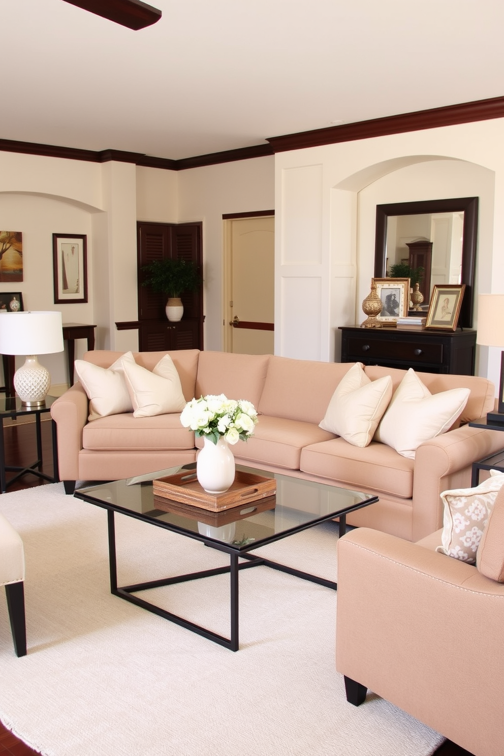 Rich espresso brown furniture complements the light decor, creating a warm and inviting atmosphere. The living room features a plush beige sofa adorned with soft pastel throw pillows, and a sleek glass coffee table sits atop a light area rug.