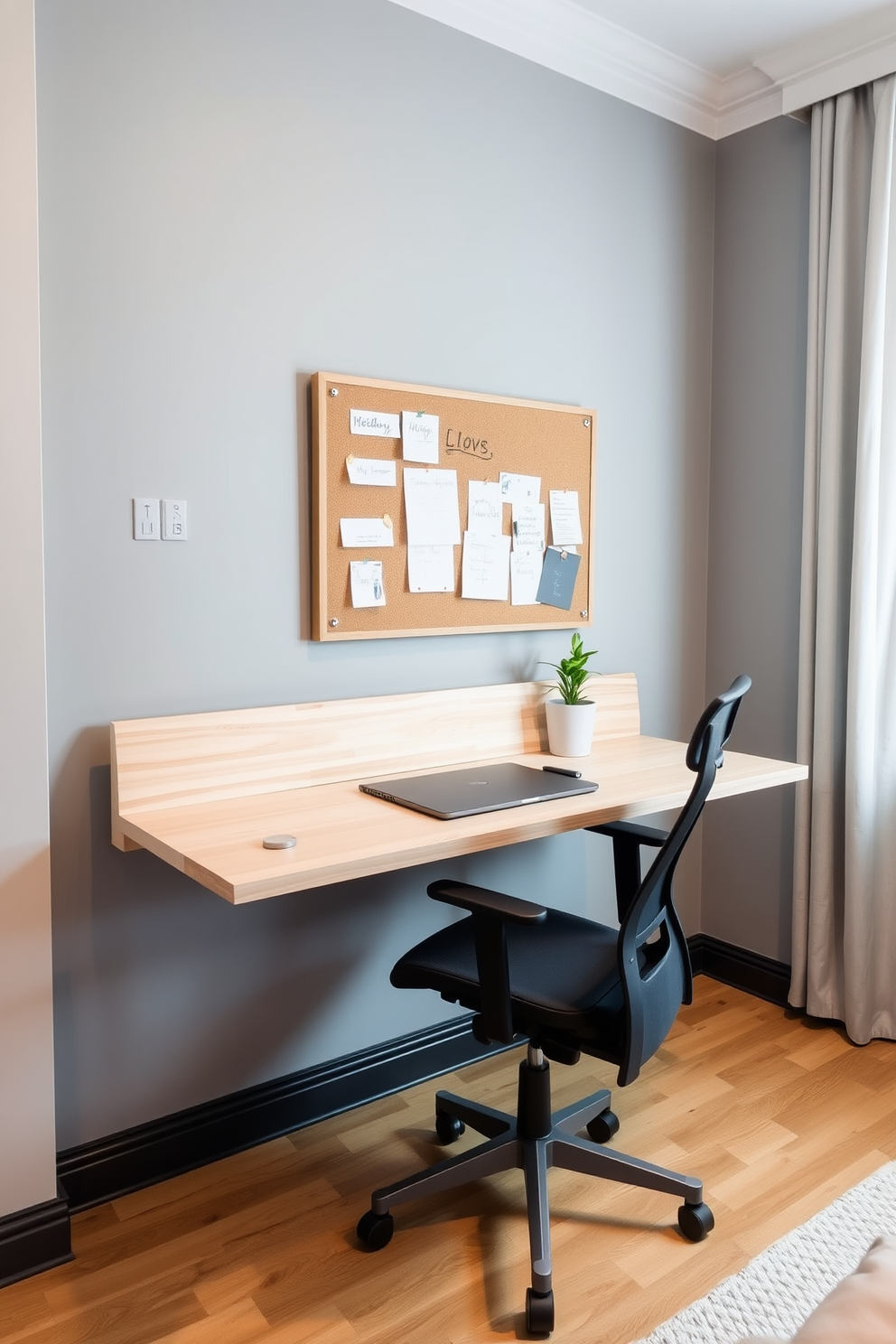 A modern study room featuring a wall-mounted desk that maximizes space efficiency. The desk is made of light wood with sleek lines and is accompanied by a comfortable ergonomic chair. The walls are painted in a soft gray, creating a calming atmosphere. A bulletin board is mounted above the desk, adorned with notes and inspiration, while a small potted plant adds a touch of greenery.