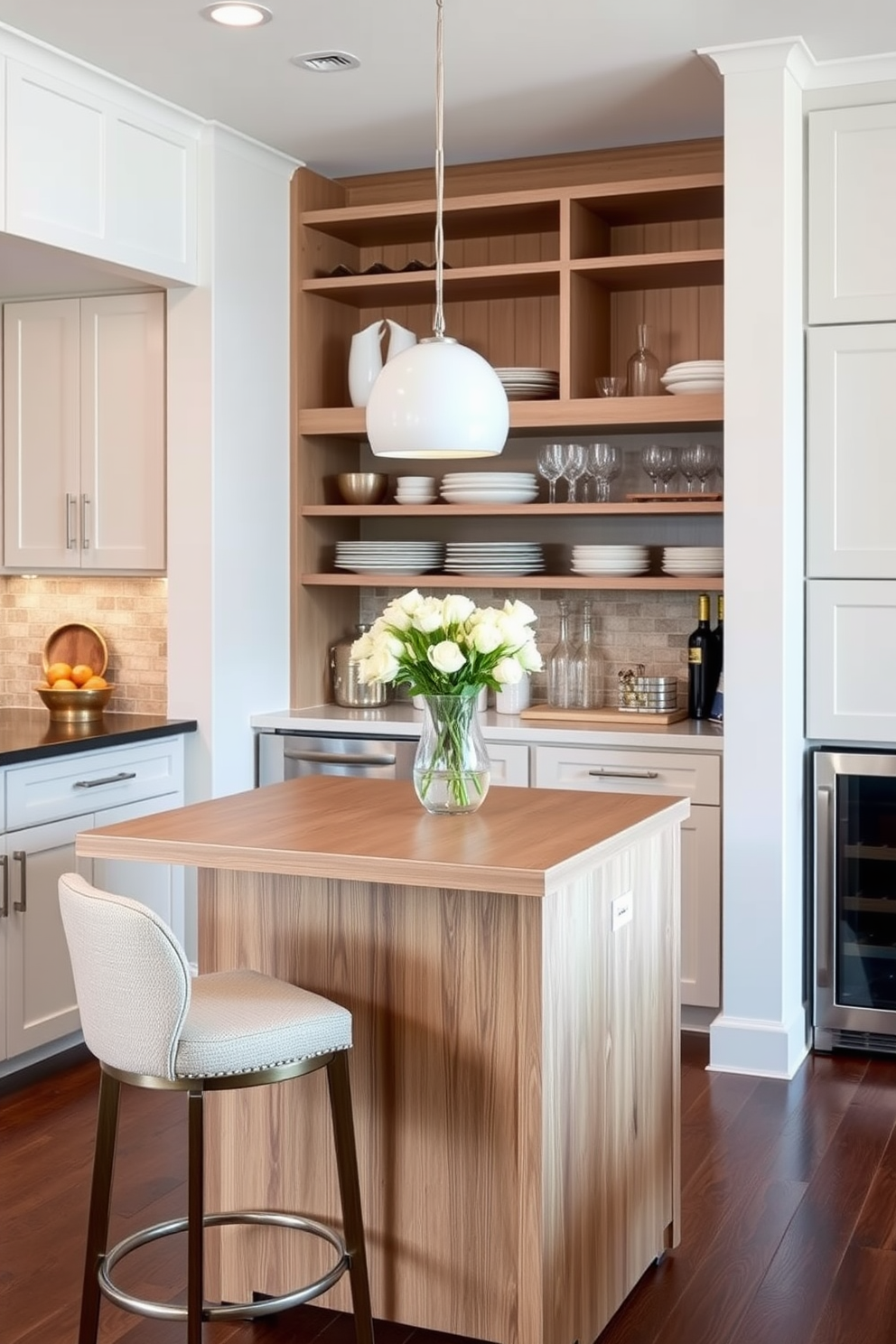 A compact island featuring a sleek countertop in a light wood finish provides additional workspace in the kitchen. Surrounding the island are bar stools with comfortable cushioning, creating an inviting area for casual dining and conversation. The butler pantry is designed with open shelving for easy access to dishware and glassware. A small sink and a wine cooler are integrated into the cabinetry, enhancing the functionality of this stylish space.