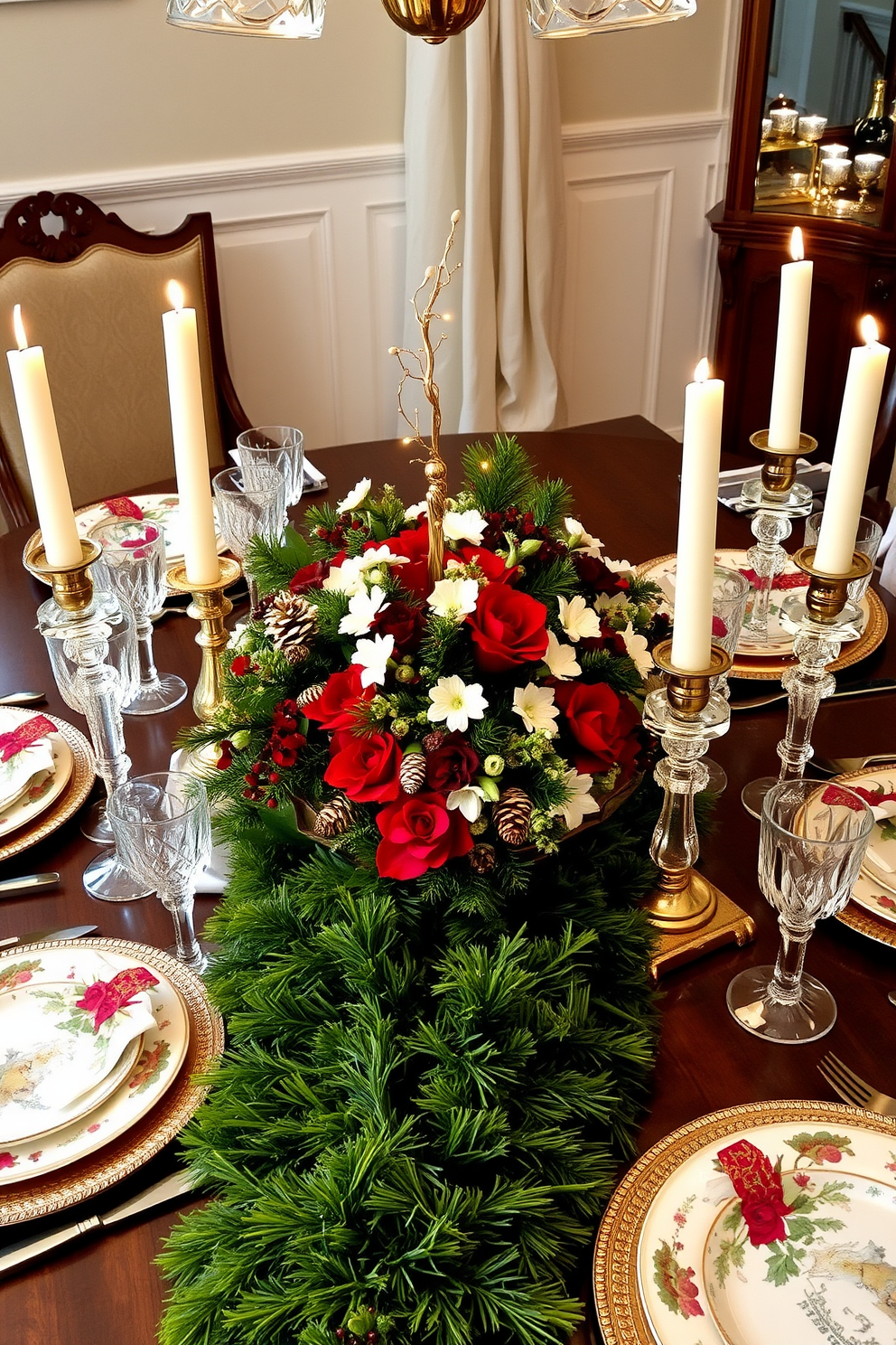 A festive dining table adorned with a lush green table runner. At the center, a stunning arrangement of red and white flowers is complemented by pinecones and twinkling fairy lights. Surrounding the centerpiece are elegant candlesticks with white candles, adding a warm glow. The table is set with fine china featuring holiday motifs and sparkling crystal glassware.