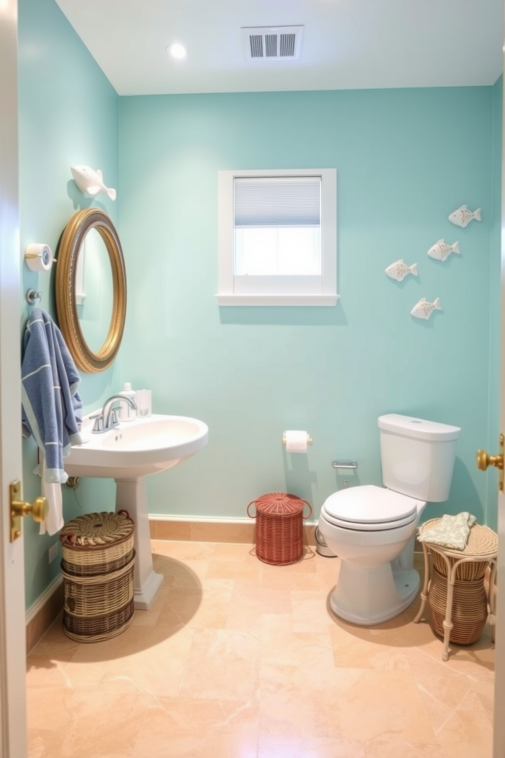 A bright coastal bathroom featuring ceramic fish decor adds a playful touch to the space. The walls are painted in a soft aqua hue, and the flooring is a light sandy beige, complementing the beachy theme.