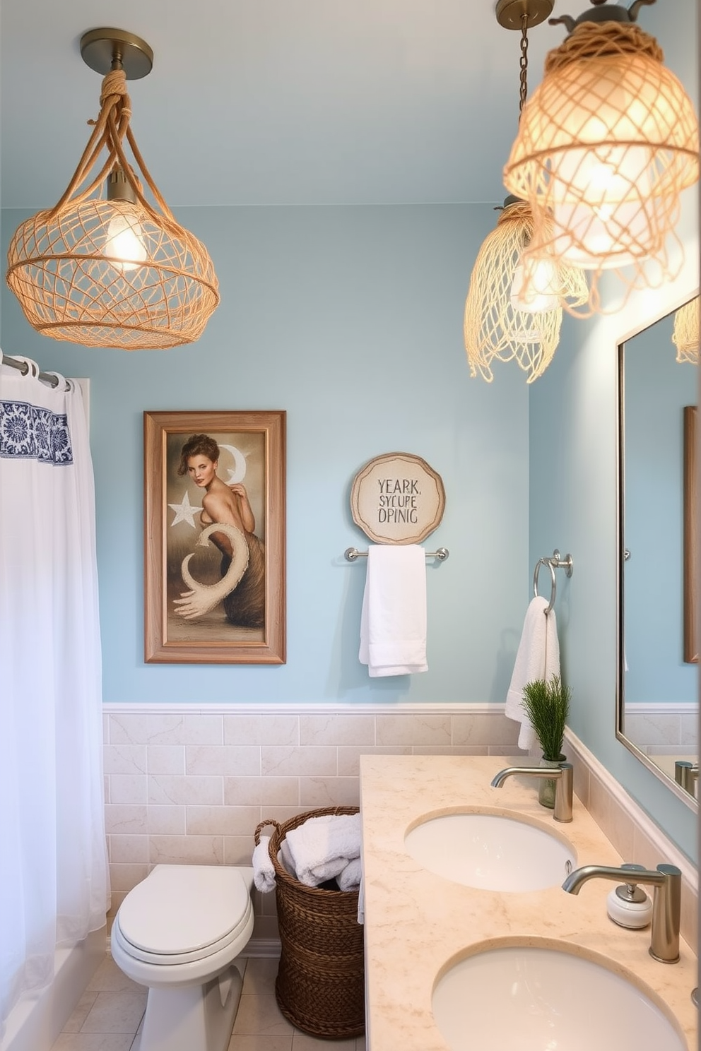 A coastal bathroom design featuring light fixtures that resemble fishing nets. The space is adorned with soft blue and sandy beige tones, creating a serene and inviting atmosphere.