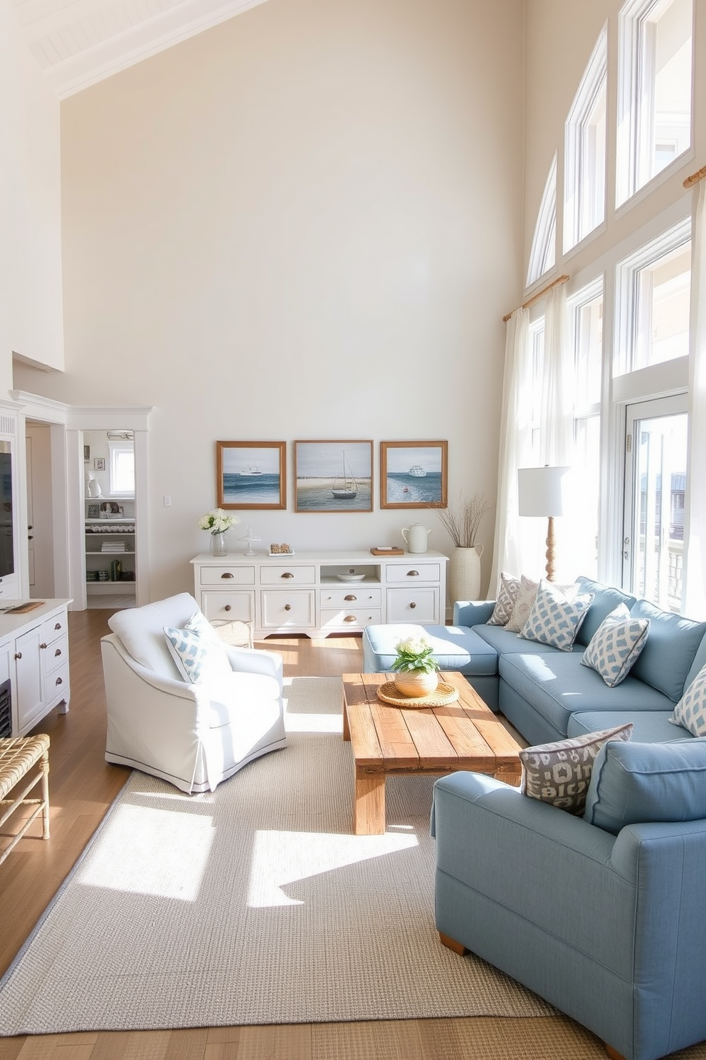 A bright and airy coastal living room features whitewashed furniture that enhances the relaxed atmosphere. A large, comfortable sectional sofa in soft blue fabric is paired with a reclaimed wood coffee table, creating a perfect gathering space. The walls are adorned with light, sandy beige tones, complemented by nautical-themed artwork. Large windows allow natural light to flood the room, showcasing sheer white curtains that gently sway with the ocean breeze.