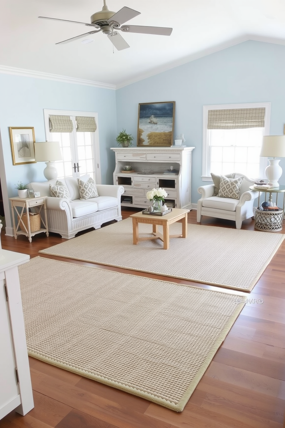 A bright coastal living room with large windows allowing ample sunlight to flood the space. The room features soft blue and white color tones, complemented by natural wood accents and comfortable, stylish furniture.