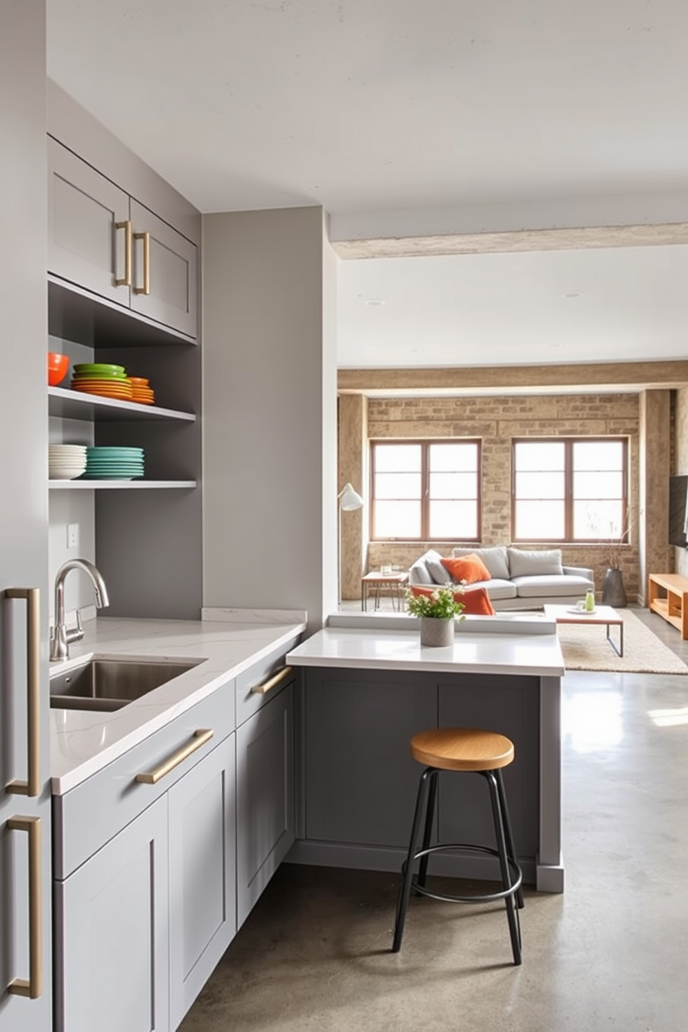 A stylish kitchenette designed for small meals features sleek cabinetry in a soft gray finish complemented by brushed nickel hardware. The countertop is a polished white quartz with subtle veining, and a compact dining table with two stools is set against a wall adorned with open shelving displaying colorful dishware. Concrete basement design ideas showcase an industrial aesthetic with exposed beams and polished concrete floors. The space includes a cozy lounge area with a sectional sofa and a minimalist coffee table, while large windows allow natural light to flood in, creating an inviting atmosphere.