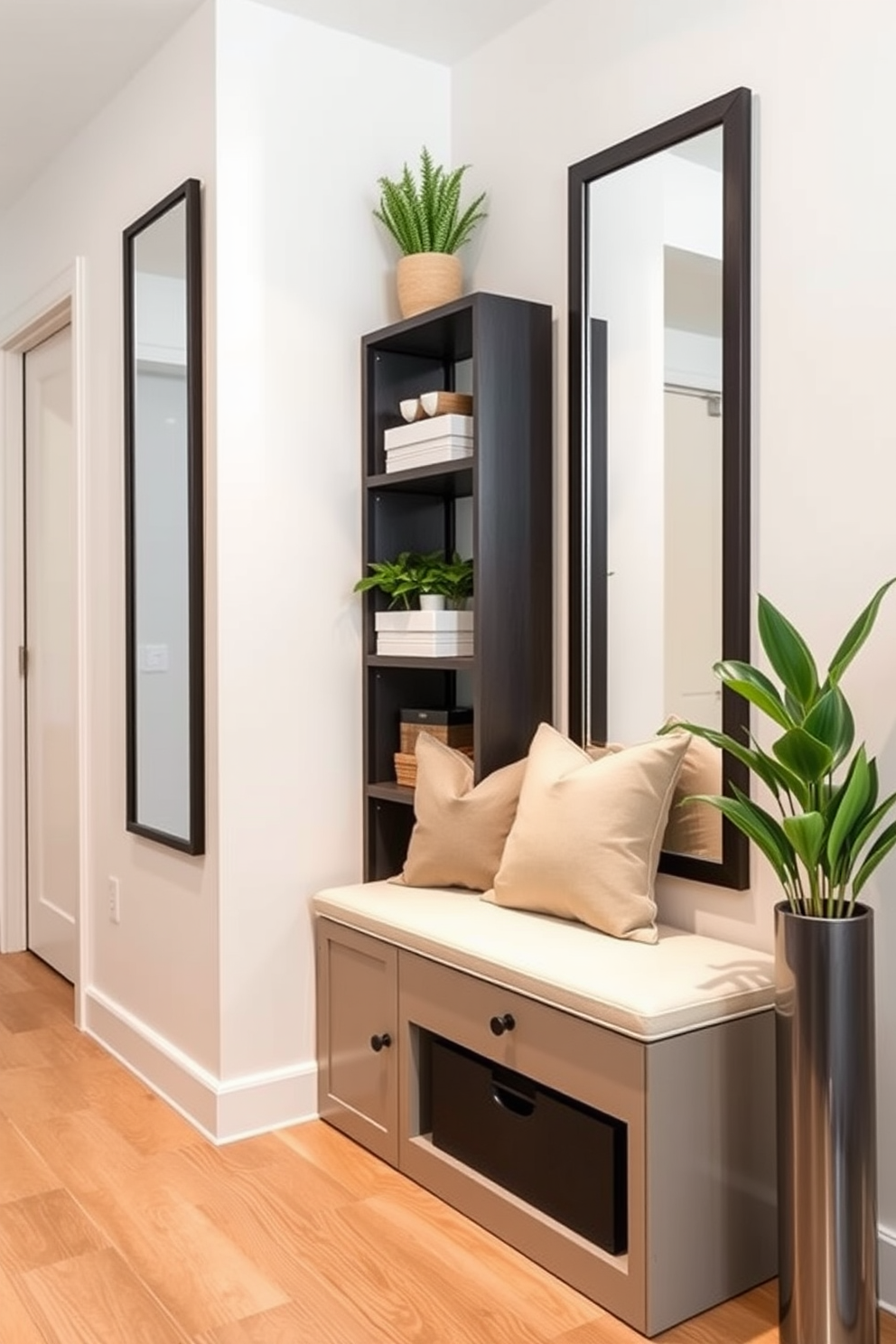 A modern minimalist console table is positioned against a light gray wall in the entryway. The table features a sleek white surface and thin black metal legs, adorned with a small potted plant and a decorative bowl. To the side, a large round mirror with a simple black frame reflects the natural light from the nearby window. The floor is finished with light wooden planks, creating a warm and inviting atmosphere.