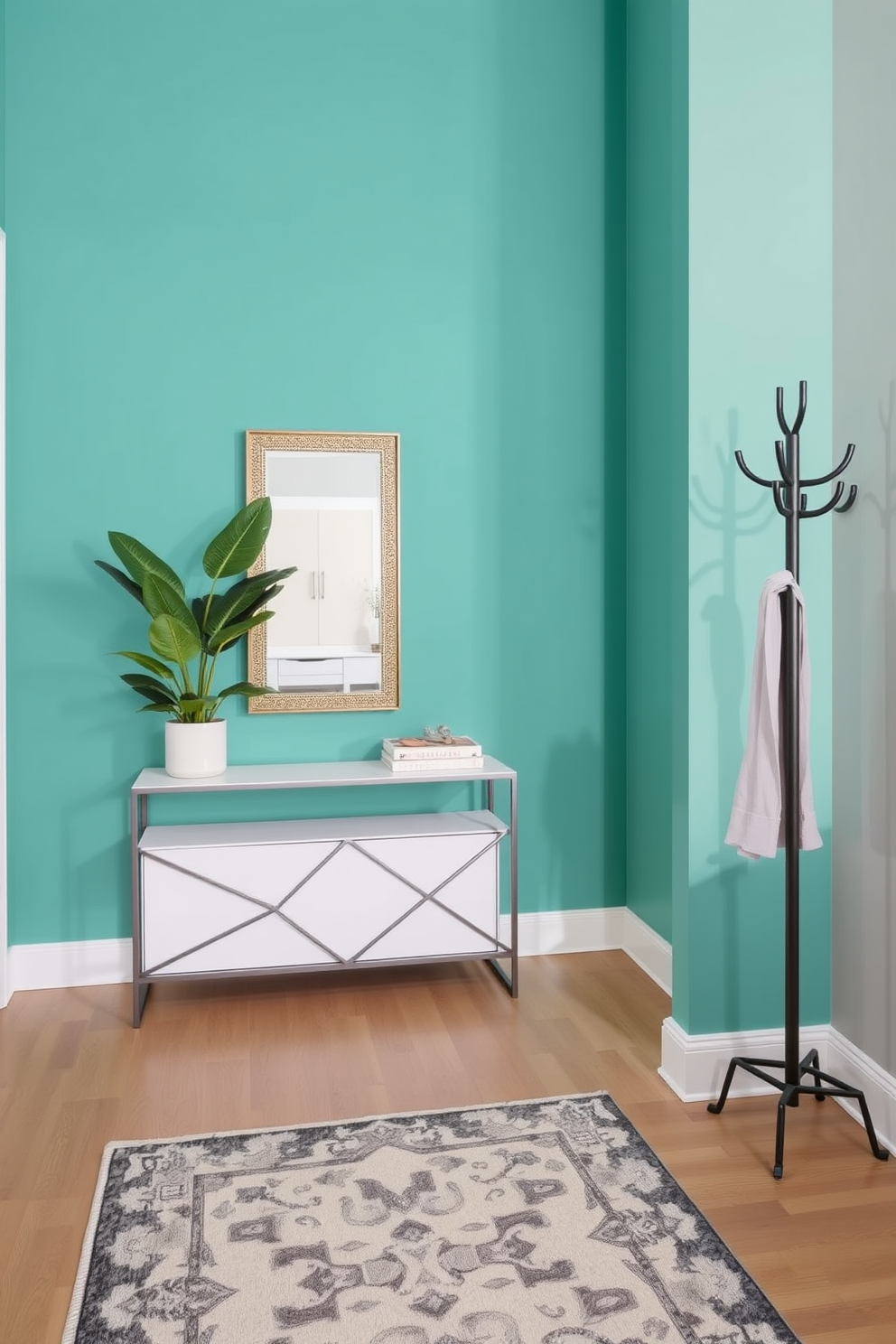 A stylish condo entryway featuring a bold accent wall painted in a vibrant teal. The space includes a sleek console table with a geometric design, topped with a decorative mirror and a potted plant for added greenery. On the floor, a chic area rug with a modern pattern complements the color scheme. A stylish coat rack stands to one side, providing both function and flair while maintaining an organized look.