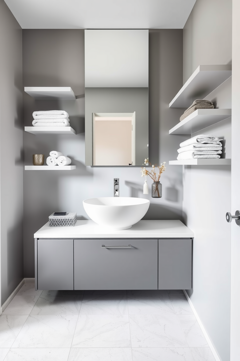 A contemporary bathroom featuring sleek storage solutions that cleverly minimize clutter. Floating shelves line the walls, displaying neatly arranged towels and decorative items, while a modern cabinet provides hidden storage beneath the sink. The color palette consists of soft grays and whites, creating an airy and spacious feel. A large mirror above the vanity reflects natural light, enhancing the overall brightness of the room.