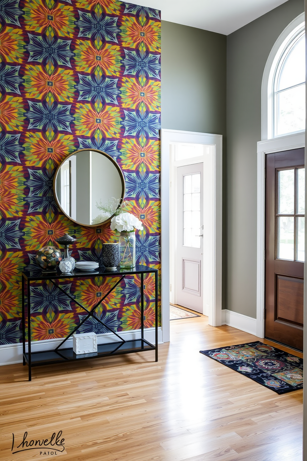 A contemporary foyer featuring layered lighting that creates a warm and inviting atmosphere. The space includes a sleek console table with an artistic lamp and a large mirror that reflects the light beautifully. The walls are adorned with a soft neutral paint, complemented by a statement chandelier that hangs gracefully above. A plush area rug lies underfoot, adding texture and comfort to the entryway.