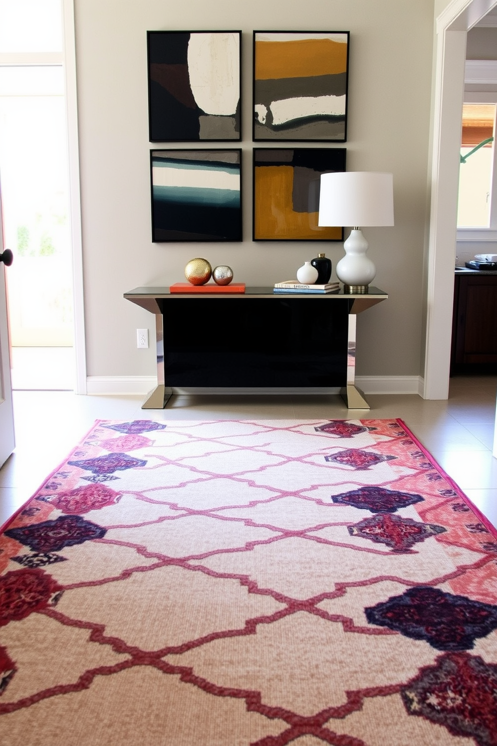 A contemporary foyer features a striking layered rug arrangement that adds depth and warmth to the space. The primary rug is a neutral tone, while a bold patterned runner overlays it, creating a welcoming and stylish entryway. The walls are adorned with modern art pieces that complement the color scheme of the rugs. A sleek console table is positioned against the wall, topped with decorative objects and a statement lamp for added ambiance.