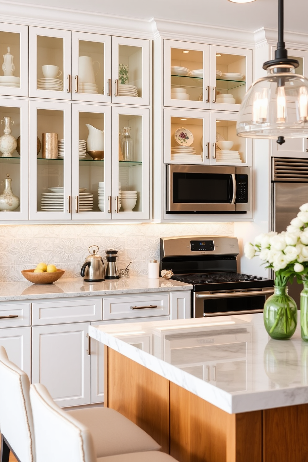 A contemporary kitchen featuring glass-front cabinets that elegantly showcase curated dishware and decorative items. The cabinets are paired with sleek stainless steel appliances and a spacious island with bar seating for casual dining.